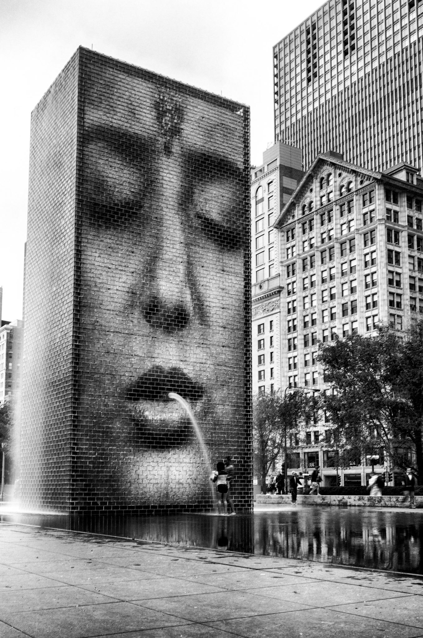 Crown Fountain Faces: One of the many states of the glass block water walls. This one is just plain fun.