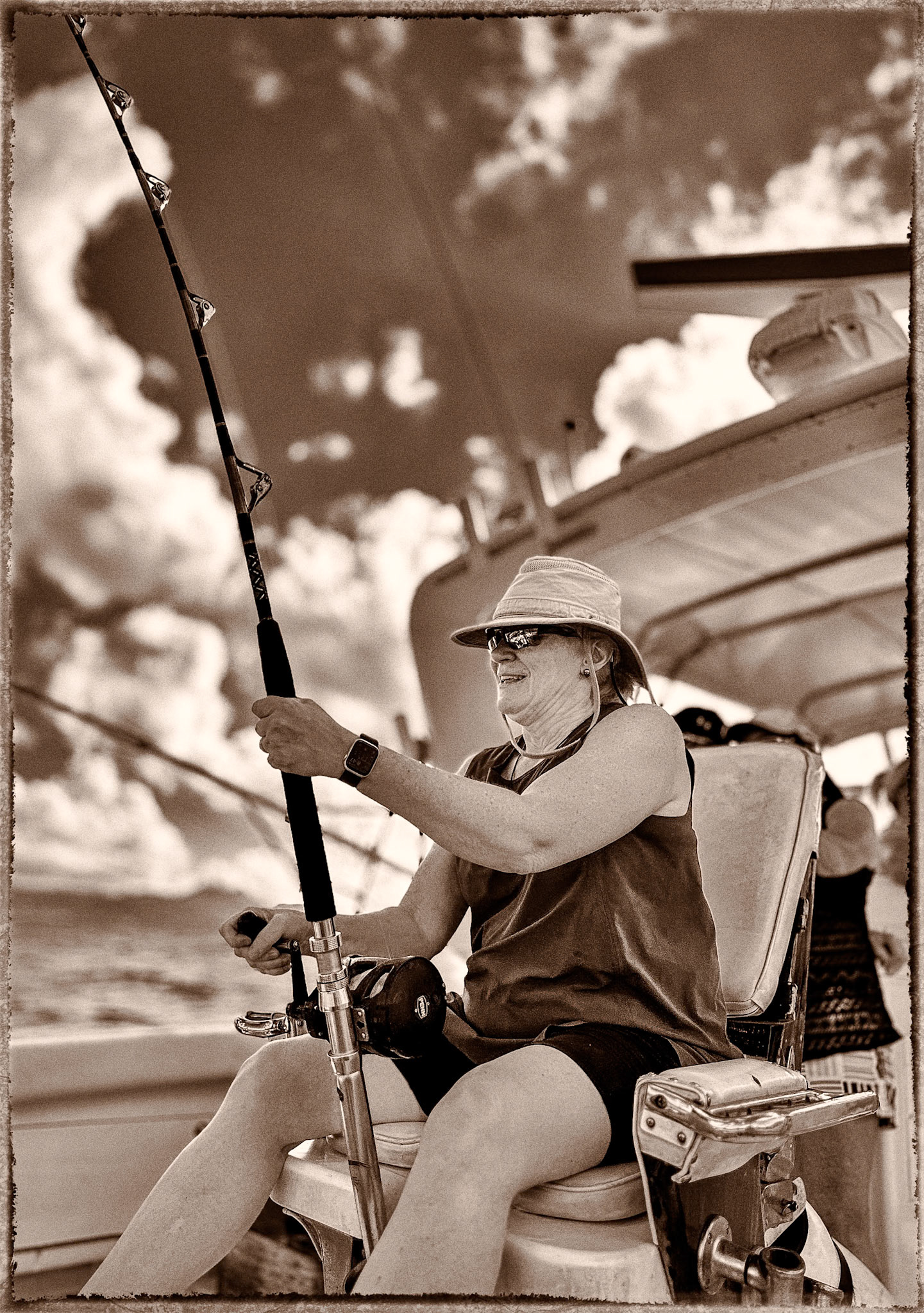 Paula reeling in her ocean catch... barracuda (with fangs!) :-)