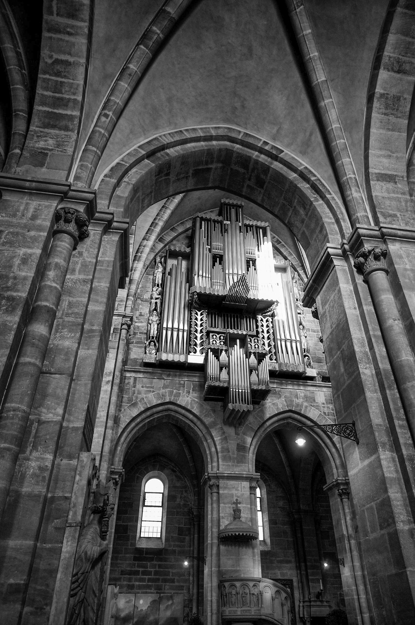 Pipe organ on second level of a gothic church in Germany.