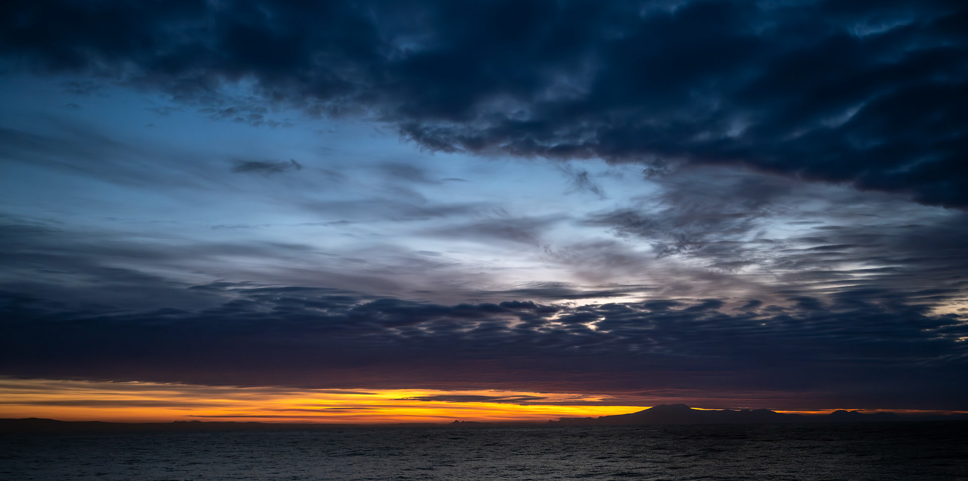 Sunset on the Bransfield Strait heading south from Frei Station, Chile, Antartica.
