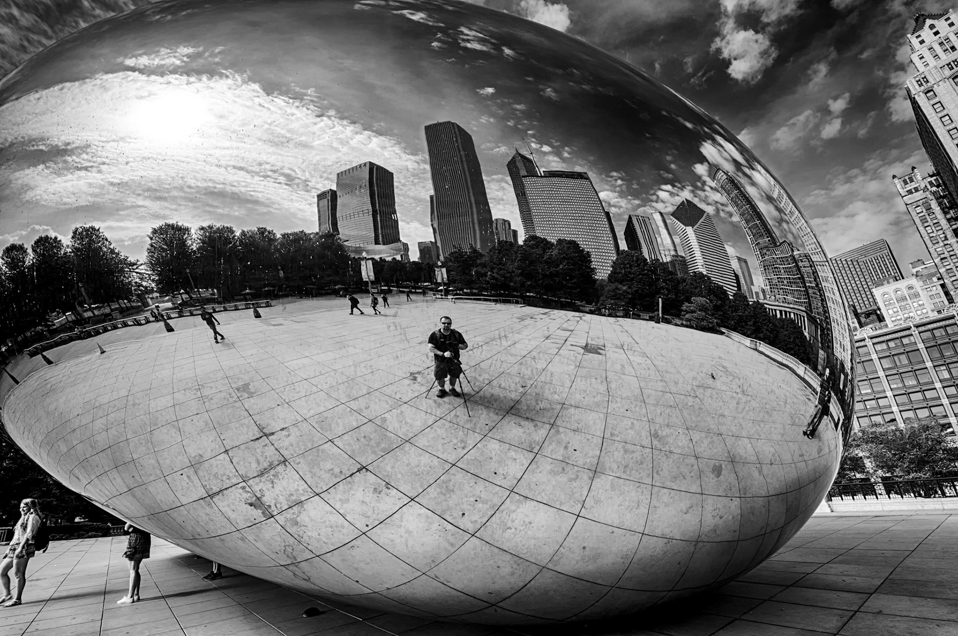 Self portrait reflection of the photographer (me) in the Cloud Gate sculpture, Chicago, Illinois.