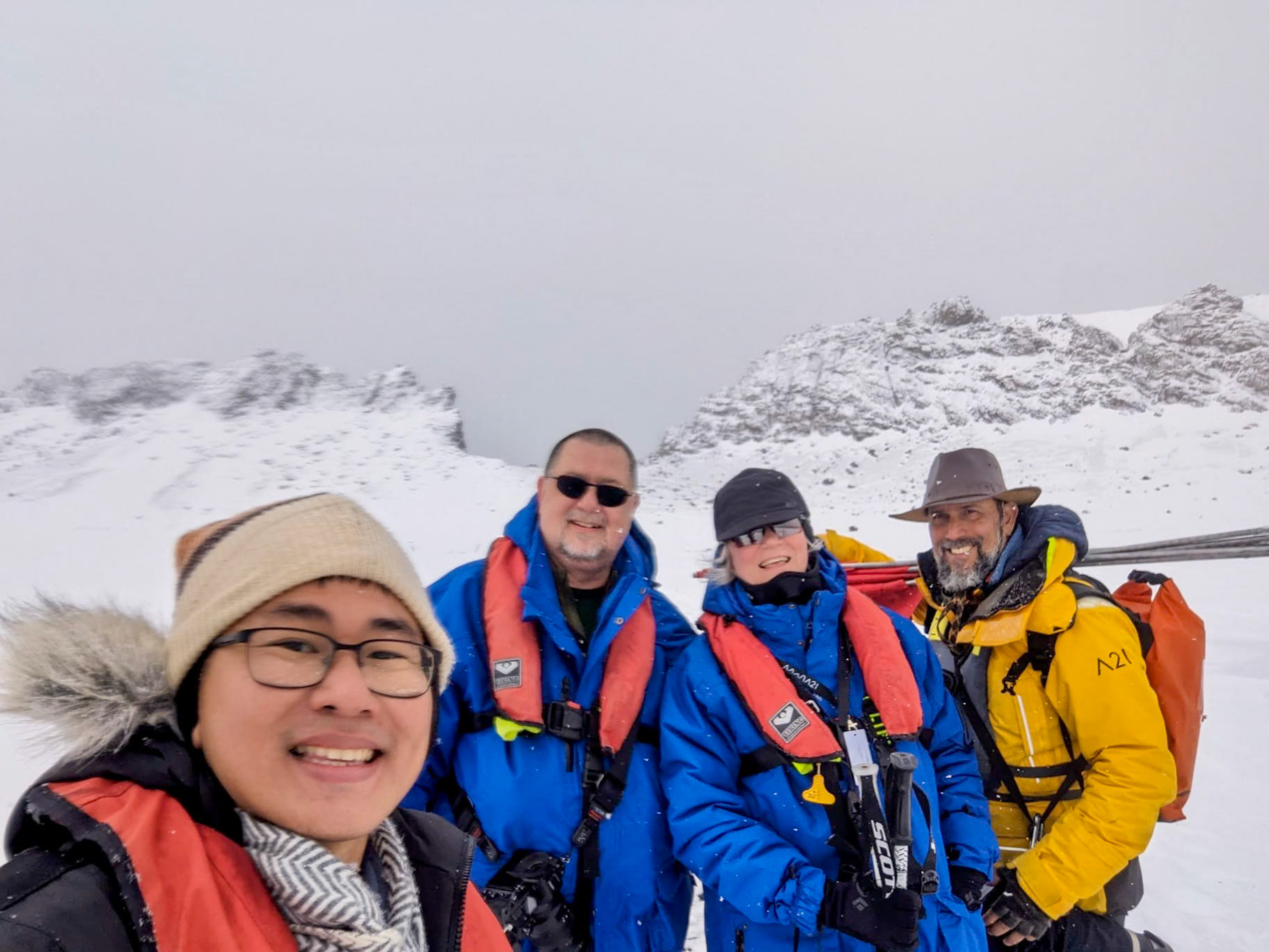 Group shot after I helped the young gentleam down from the slippery viewpoint in the background of the short hike.