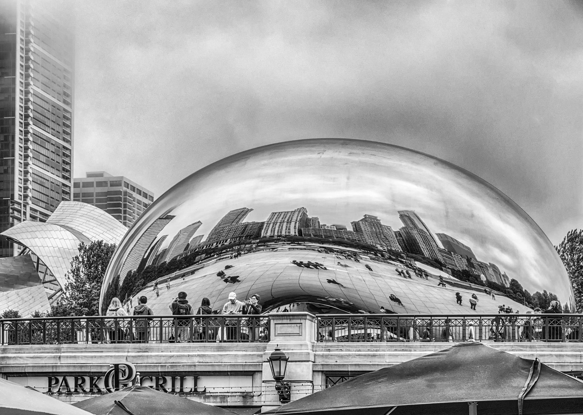Reflection of the Chicago skyline in Cloud Gate at Millennium Park - BW