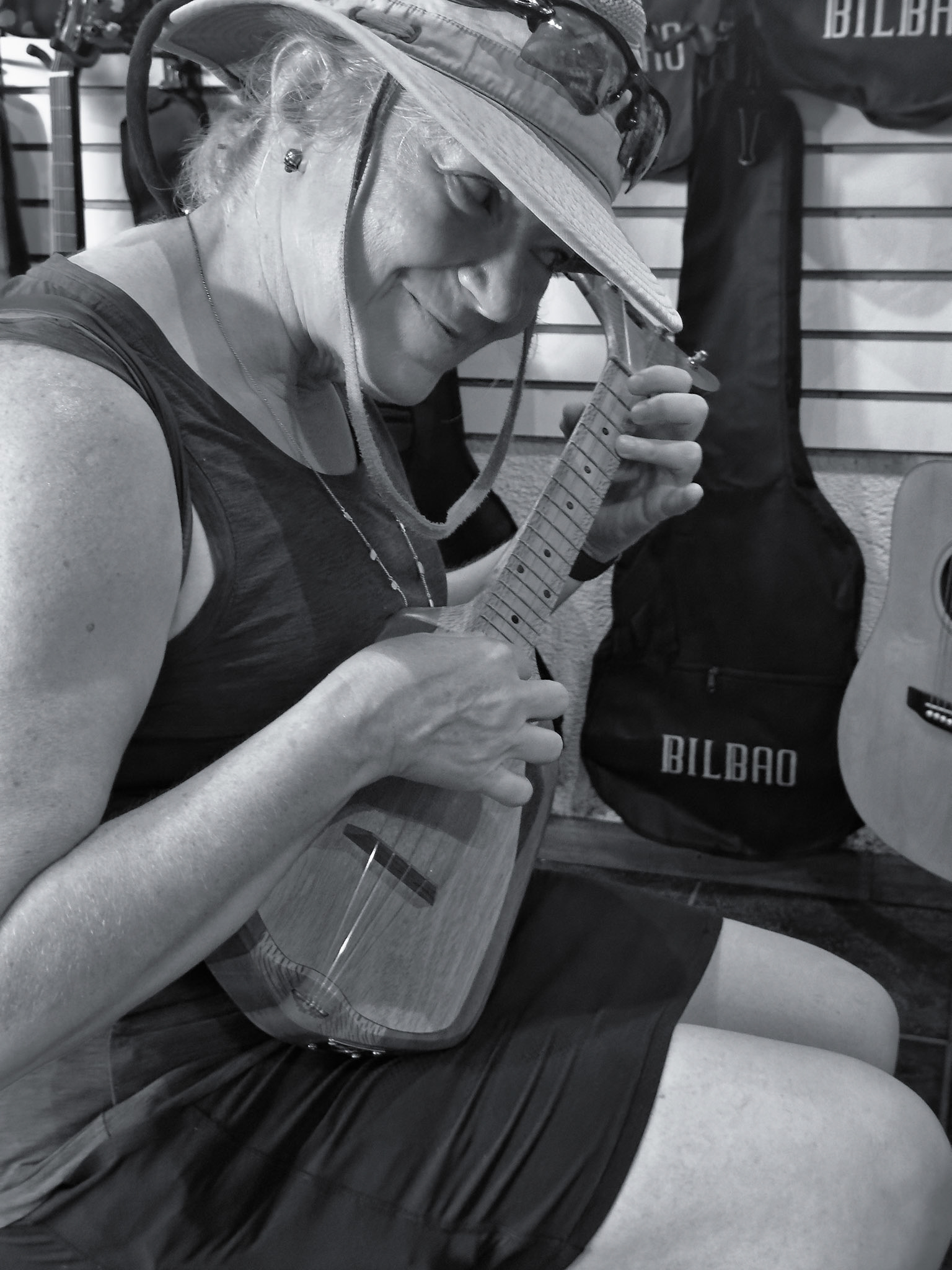 Ukulele girl noodling around on the island.