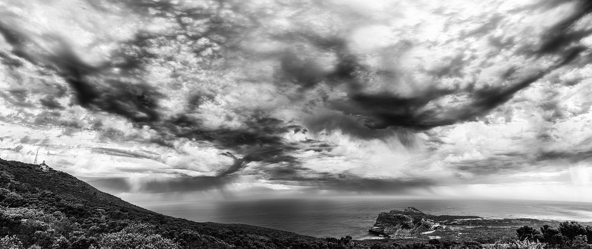Some "mild weather" off the cape of Good Hope, South Africa. That's one ominous looking sky to me. Imagine if you were sailing these waters in the 1800's and didn't have all our modern weather forecasting, ocean tide and current charts, GPS positioning data, etc.. Makes what was done even that much more impressive.Can you spot the line between the Indian and Atlantic Oceans?