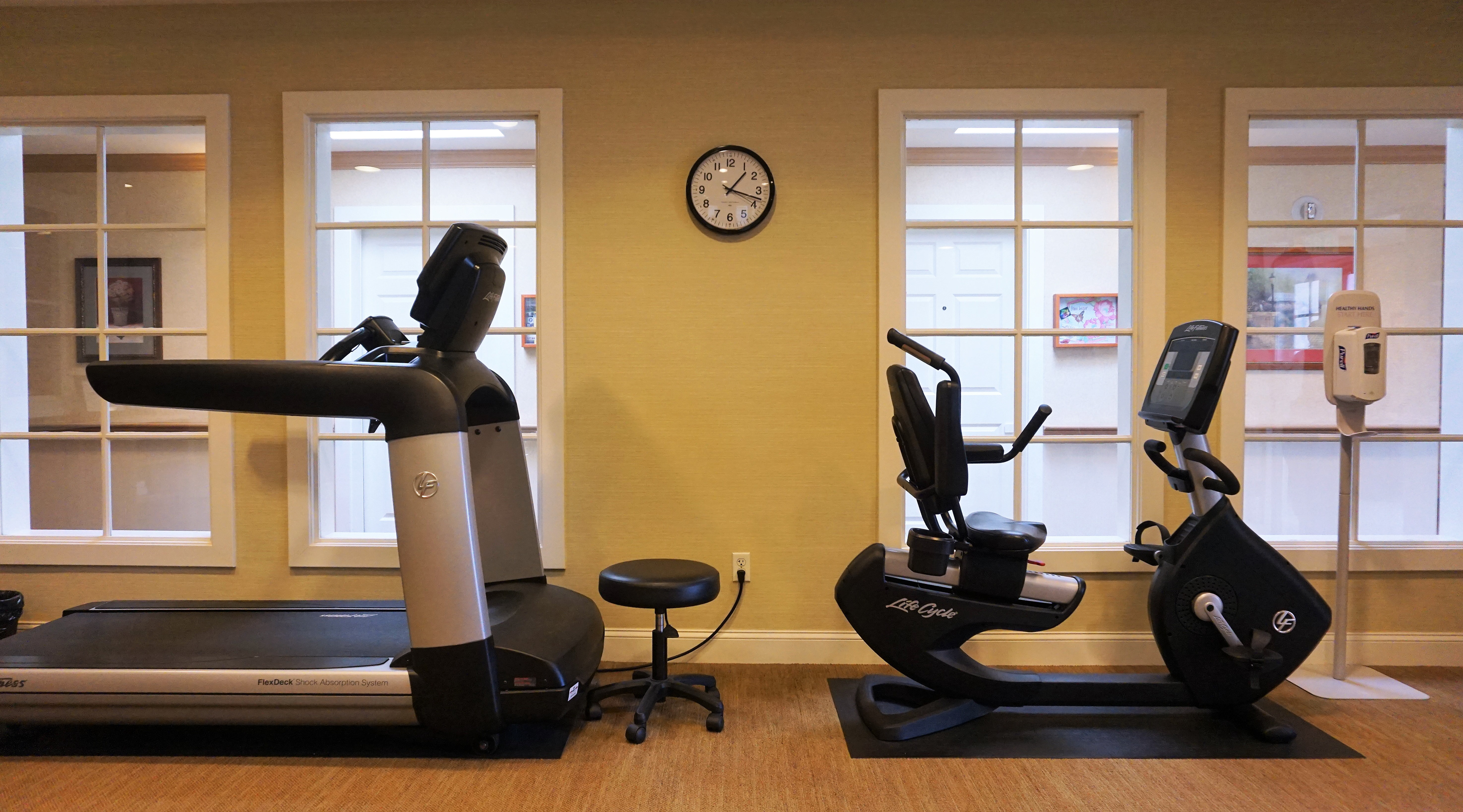 Figure 26. EXERCISE ROOM The exercise room has windows open to the hall way, which not only can absorb more lights inside, but also makes the gym visually accessible to residents in the hallway and attracts them to use the facilities.