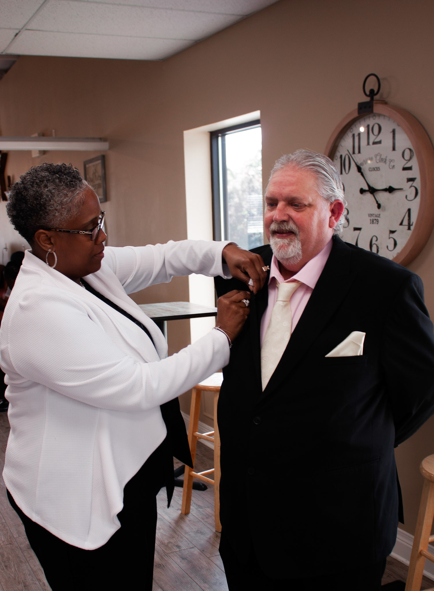 Father of the Bride having his ......... pinned