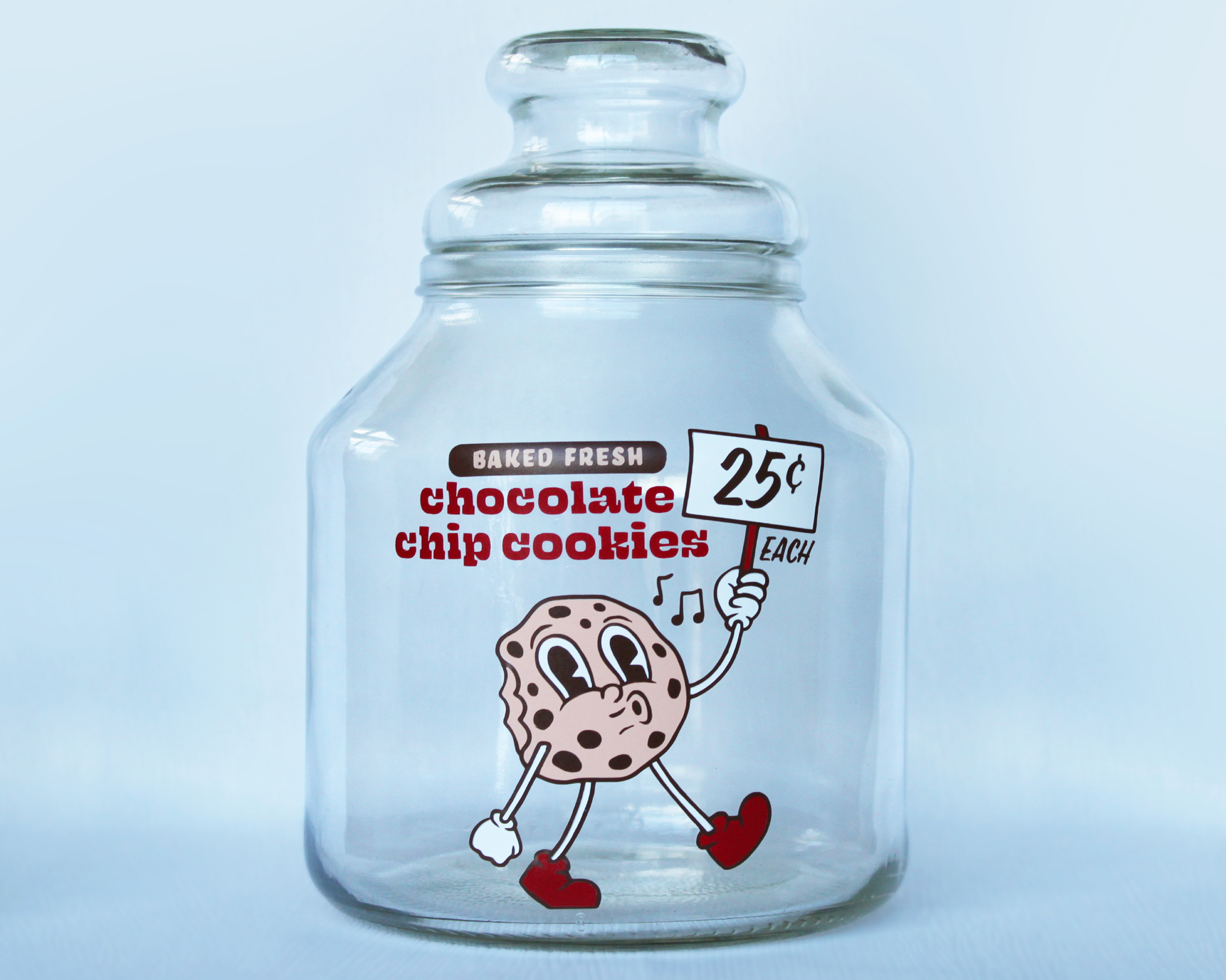 Vintage cookie jar, vinyl on glass.