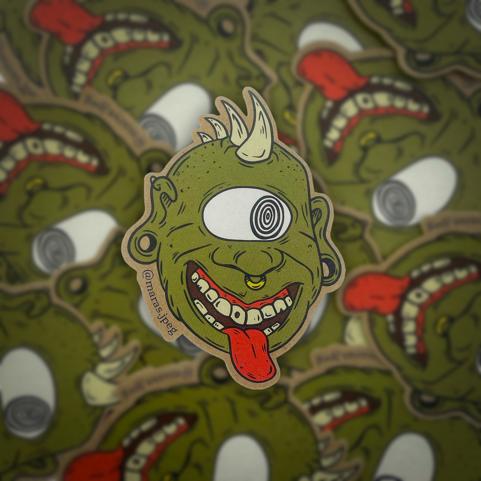 Monster sticker on kraft paper.