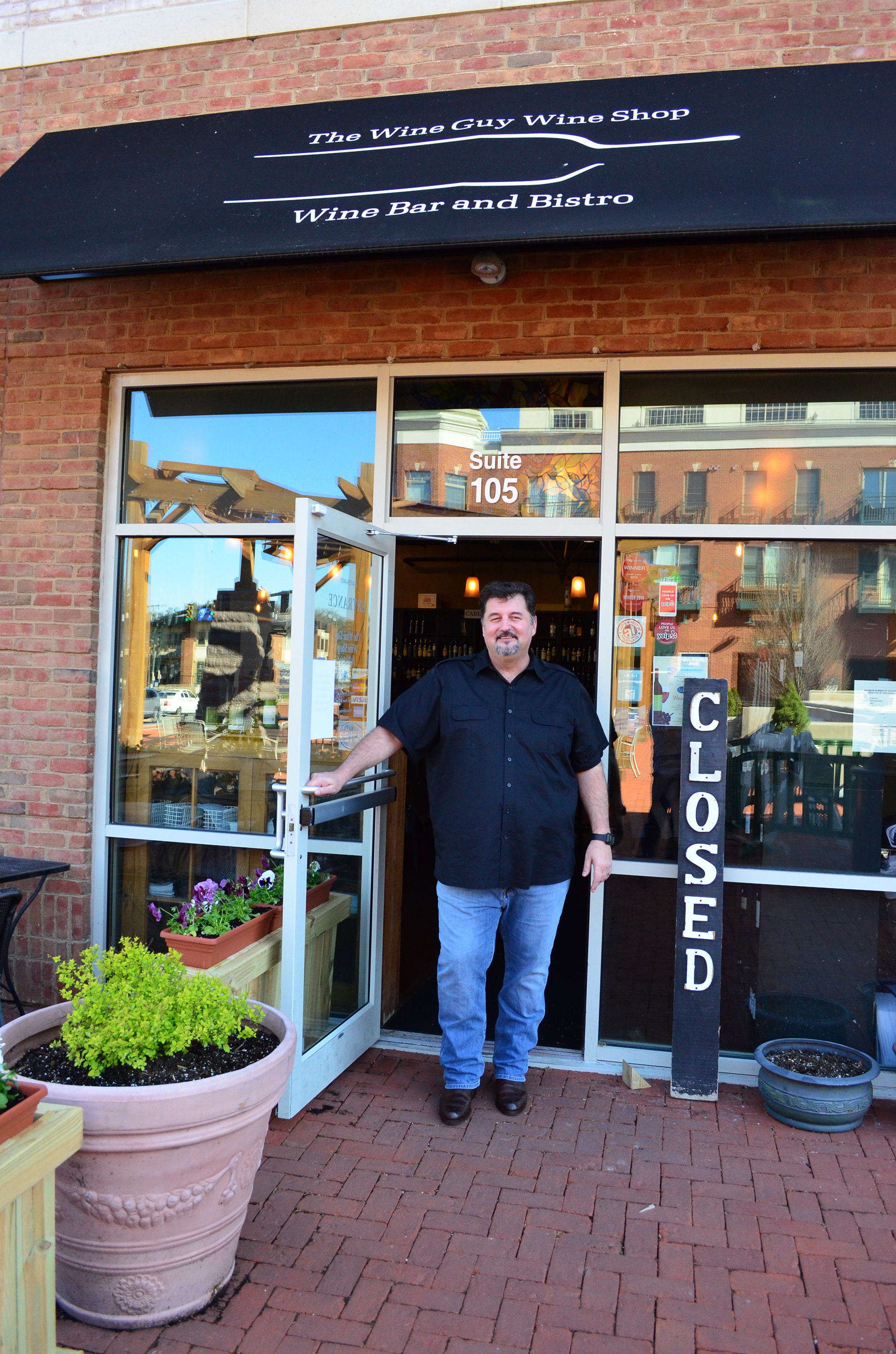Mike Schaefer, the new owner of "Somedays" welcomes visitors during his soft opening evening.