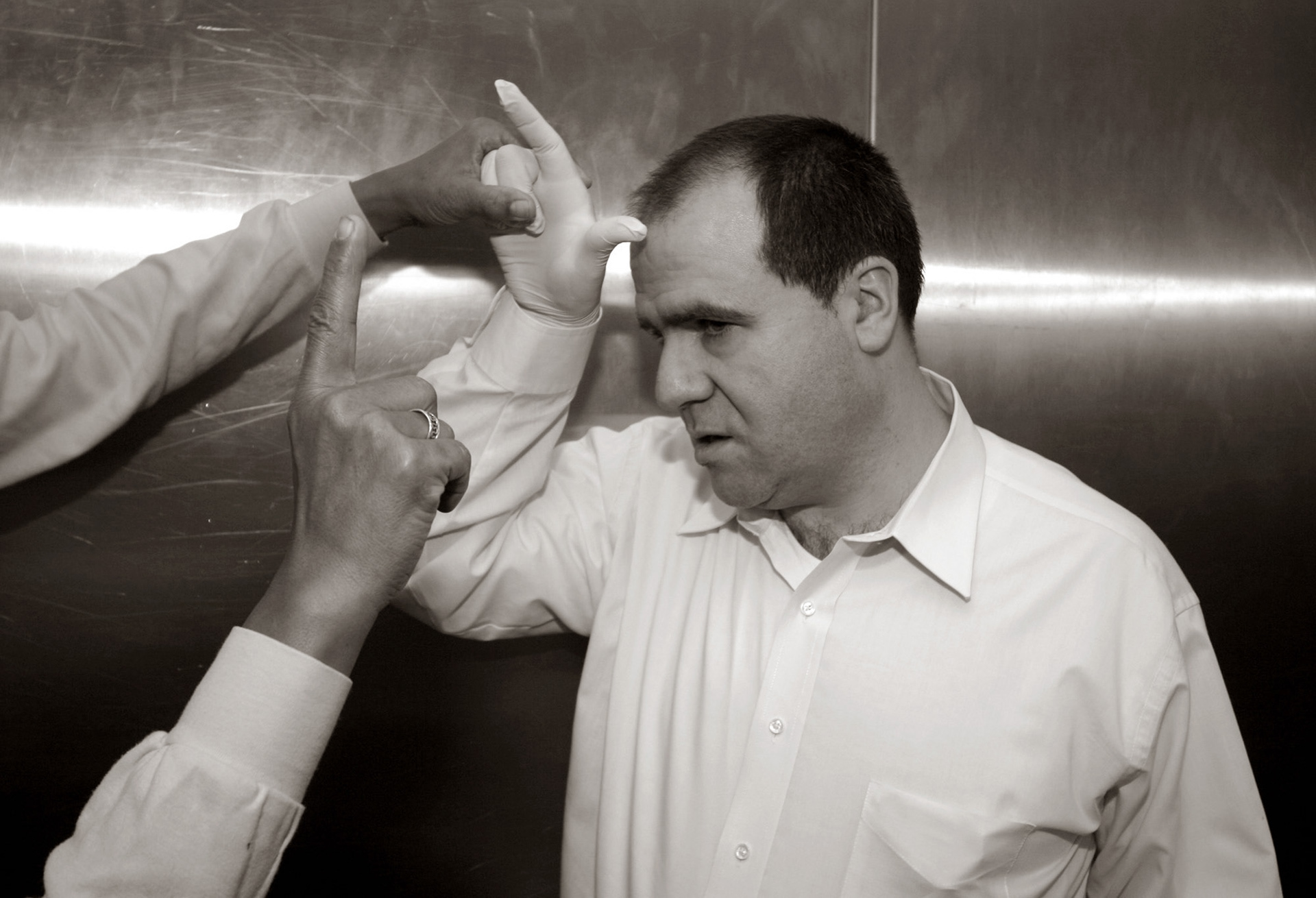 An aide goofs with Michael.