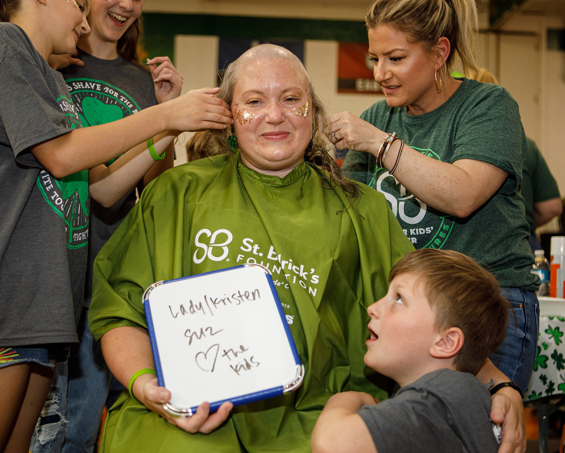 Sierah Heiserman, 12, of Zionsville has her head shaved by Joni Laundry of Emmaus on Friday, April 26, 2024, during the Emmaus Shave the Brave fundraiser at Emmaus High School in Emmaus. The event, intended to help raise money for children battling cancer, was sponsored by the St. Baldrick’s Foundation. (Jane Therese / Special to The Morning Call)