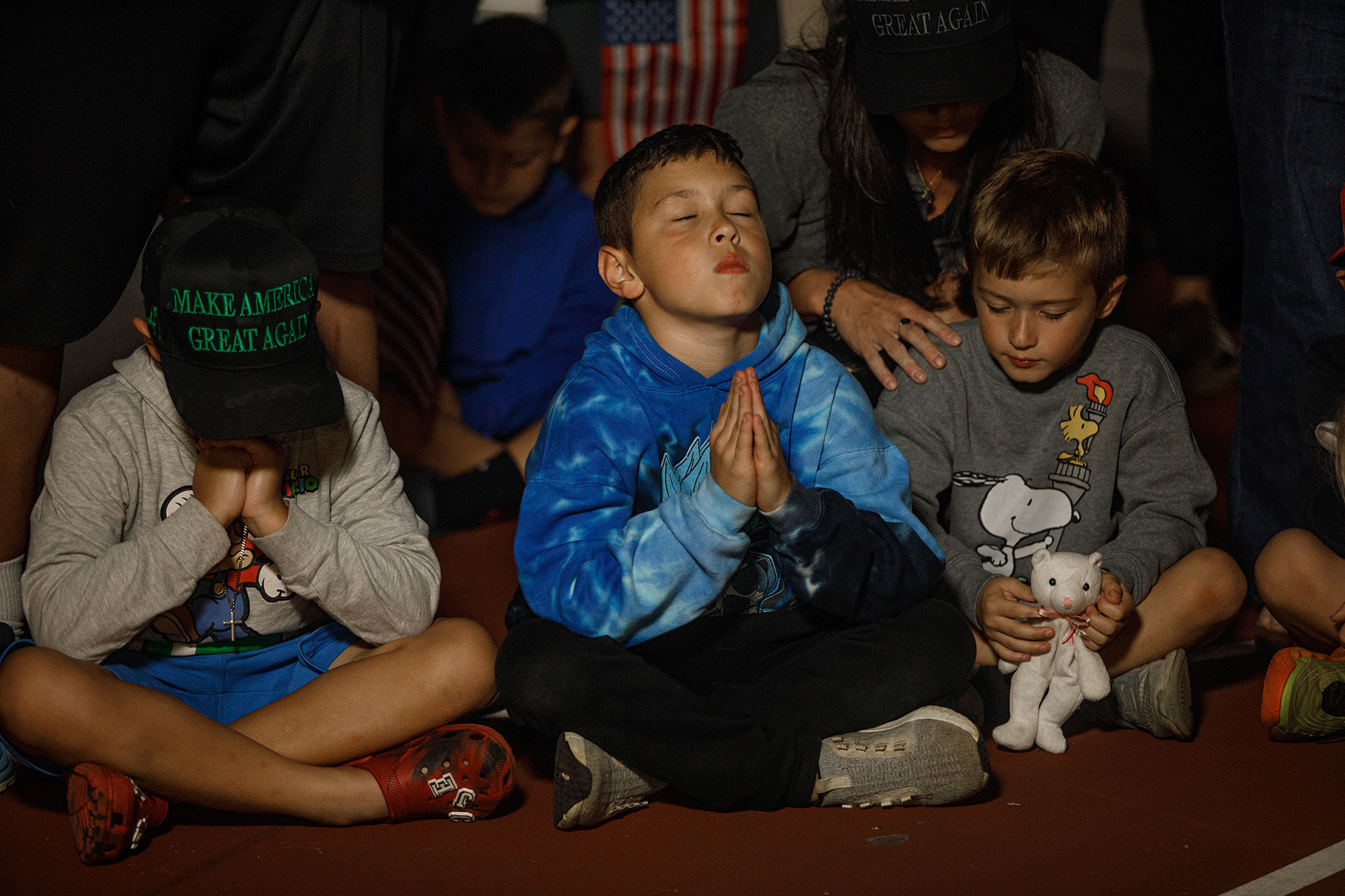 People attend a candelight vigil in memory of slain conservative political activist Charlie Kirk
