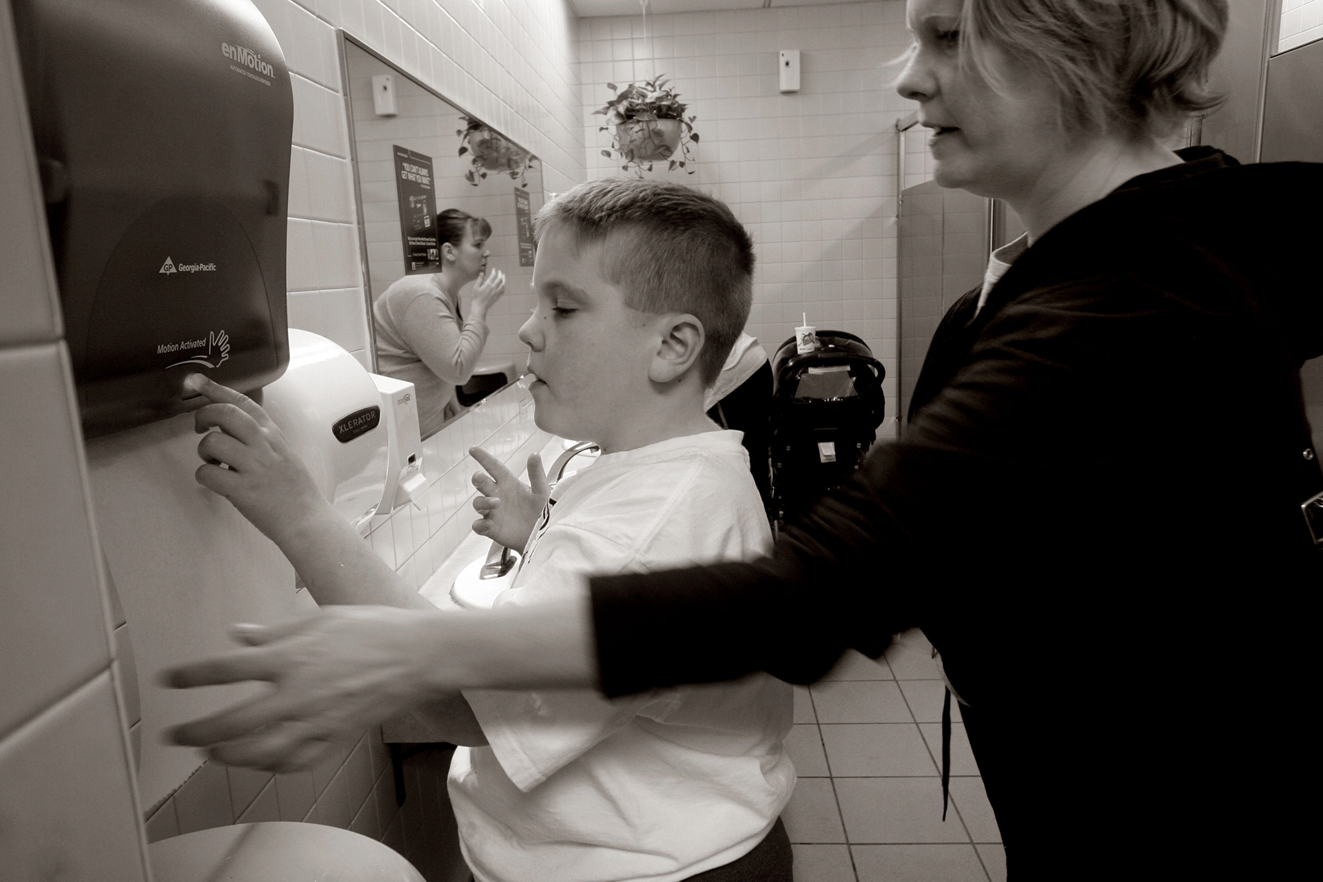Jill and Drew in the woman's bathroom at the mall