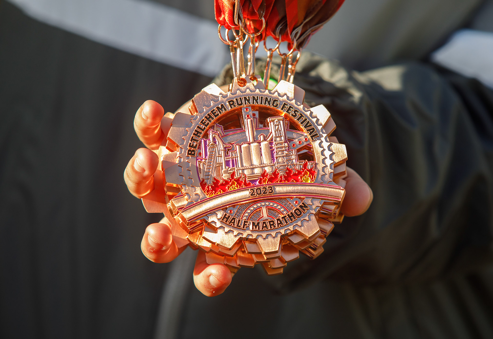 A stack of medals for finishers in the Lehigh Valley Orthopedic Institute Half Marathon Sunday, Oct. 22, 2023, at SteelStacks in Bethlehem.