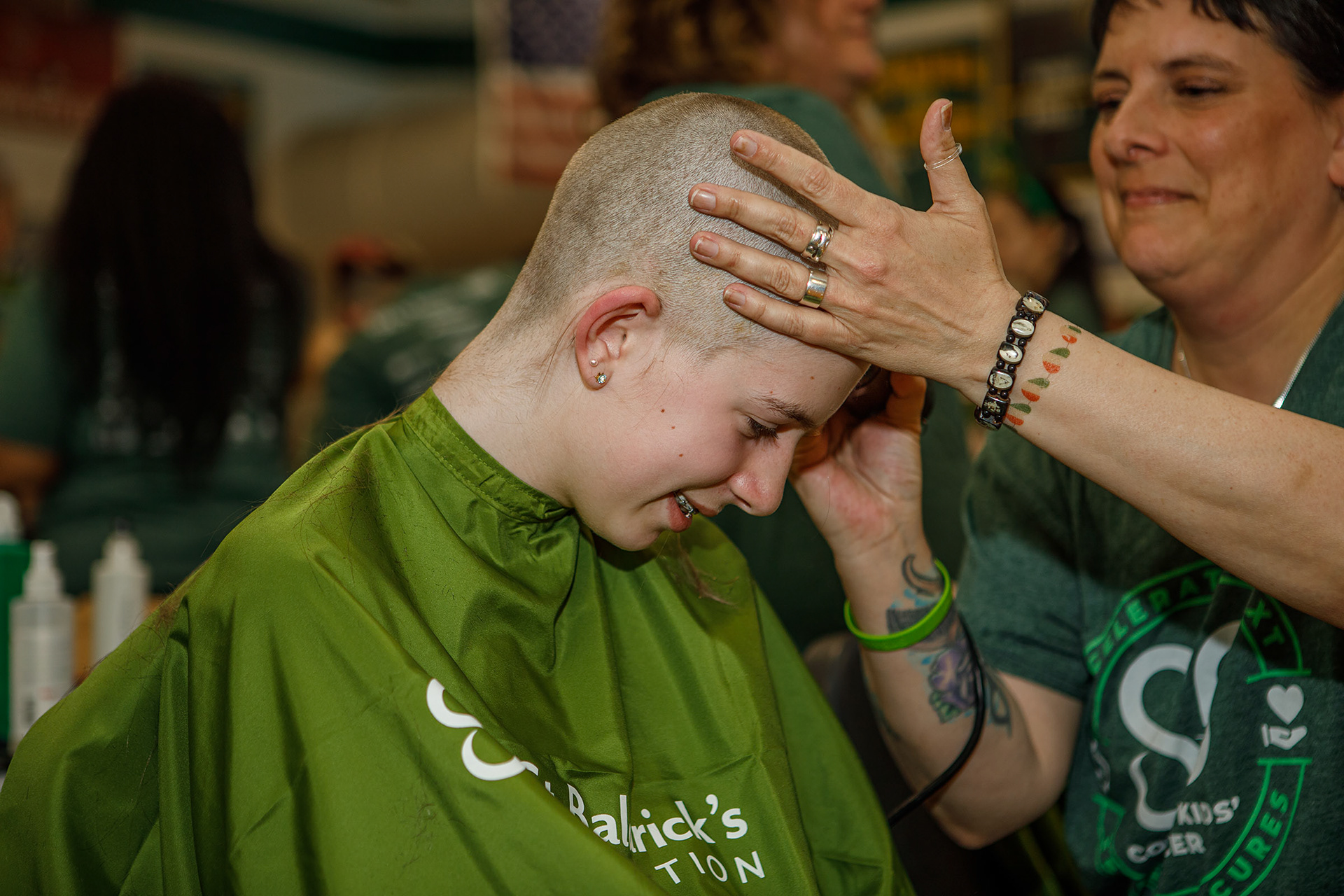 Sierah Heiserman, 12, of Zionsville has her head shaved by Joni Laundry of Emmaus on Friday, April 26, 2024, during the Emmaus Shave the Brave fundraiser at Emmaus High School in Emmaus. The event, intended to help raise money for children battling cancer, was sponsored by the St. Baldrick’s Foundation. (Jane Therese / Special to The Morning Call)