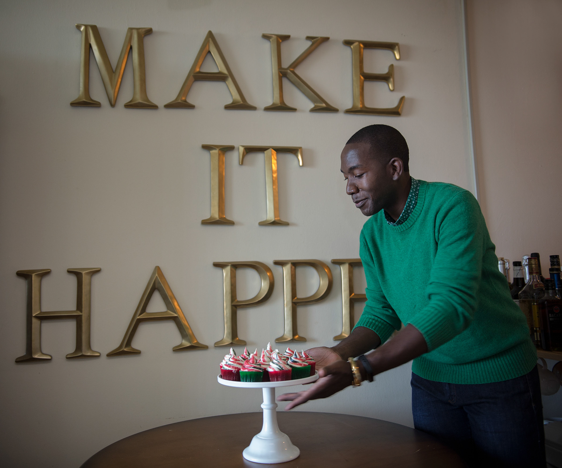 Buki Elegbede of “The Buki Show,” bakes homemade chocolate candy cane swirl cupcakes for the holiday season in Newark. (Jane Therese for Edible New Jersey)