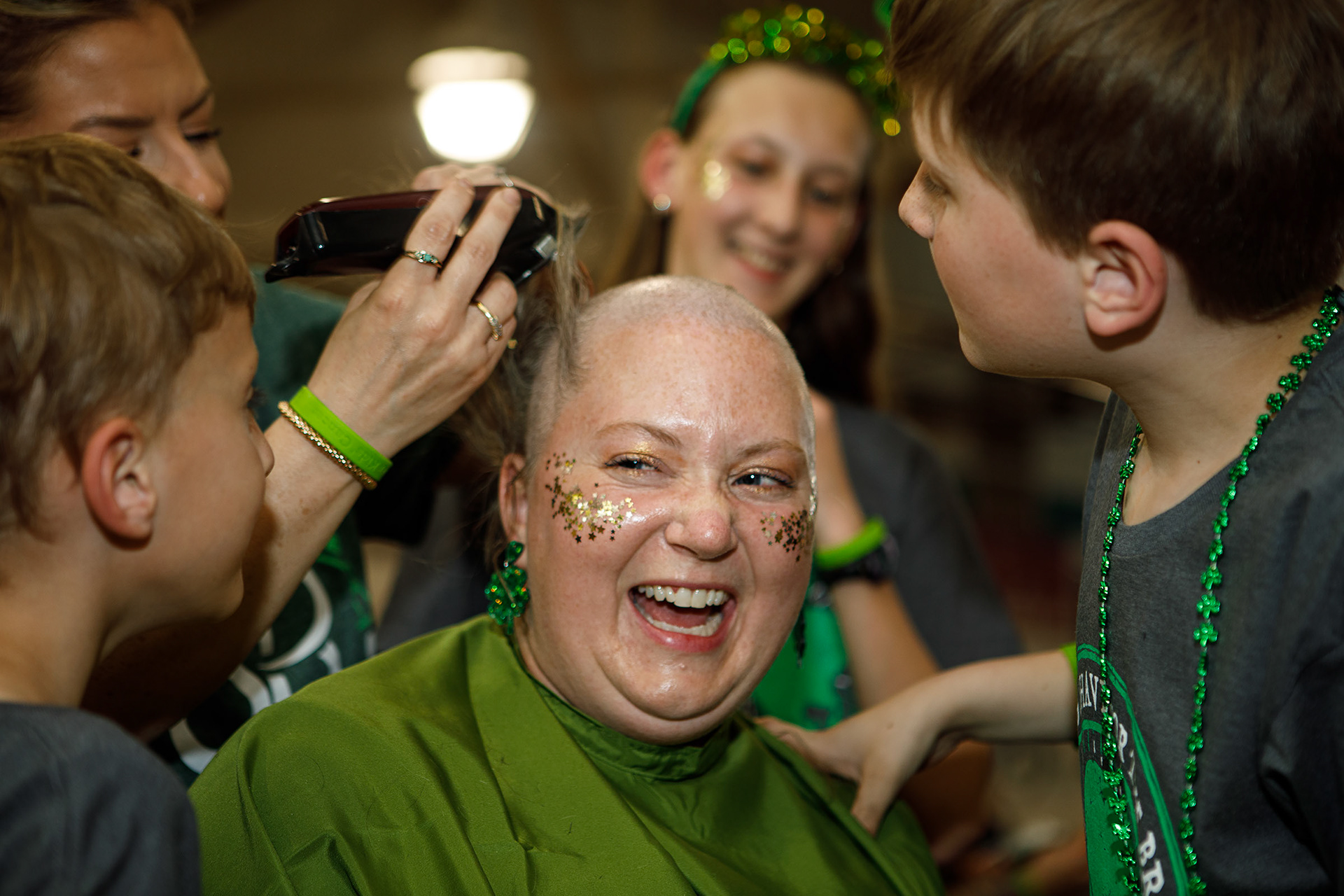 Sierah Heiserman, 12, of Zionsville has her head shaved by Joni Laundry of Emmaus on Friday, April 26, 2024, during the Emmaus Shave the Brave fundraiser at Emmaus High School in Emmaus. The event, intended to help raise money for children battling cancer, was sponsored by the St. Baldrick’s Foundation. (Jane Therese / Special to The Morning Call)