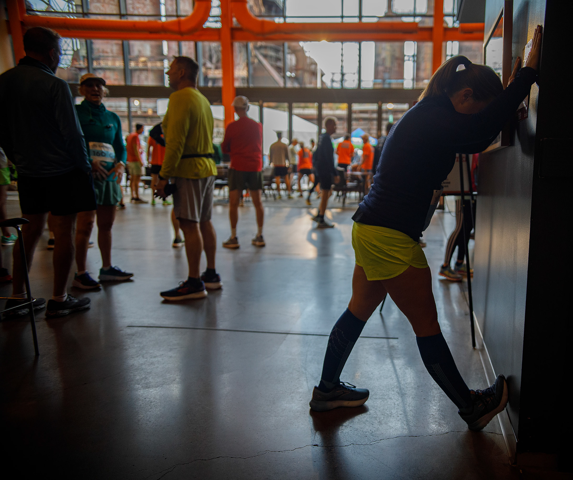 Runners ready themselves prior to the Lehigh Valley Orthopedic Institute Half Marathon Sunday, Oct. 22, 2023, at SteelStacks in Bethlehem.