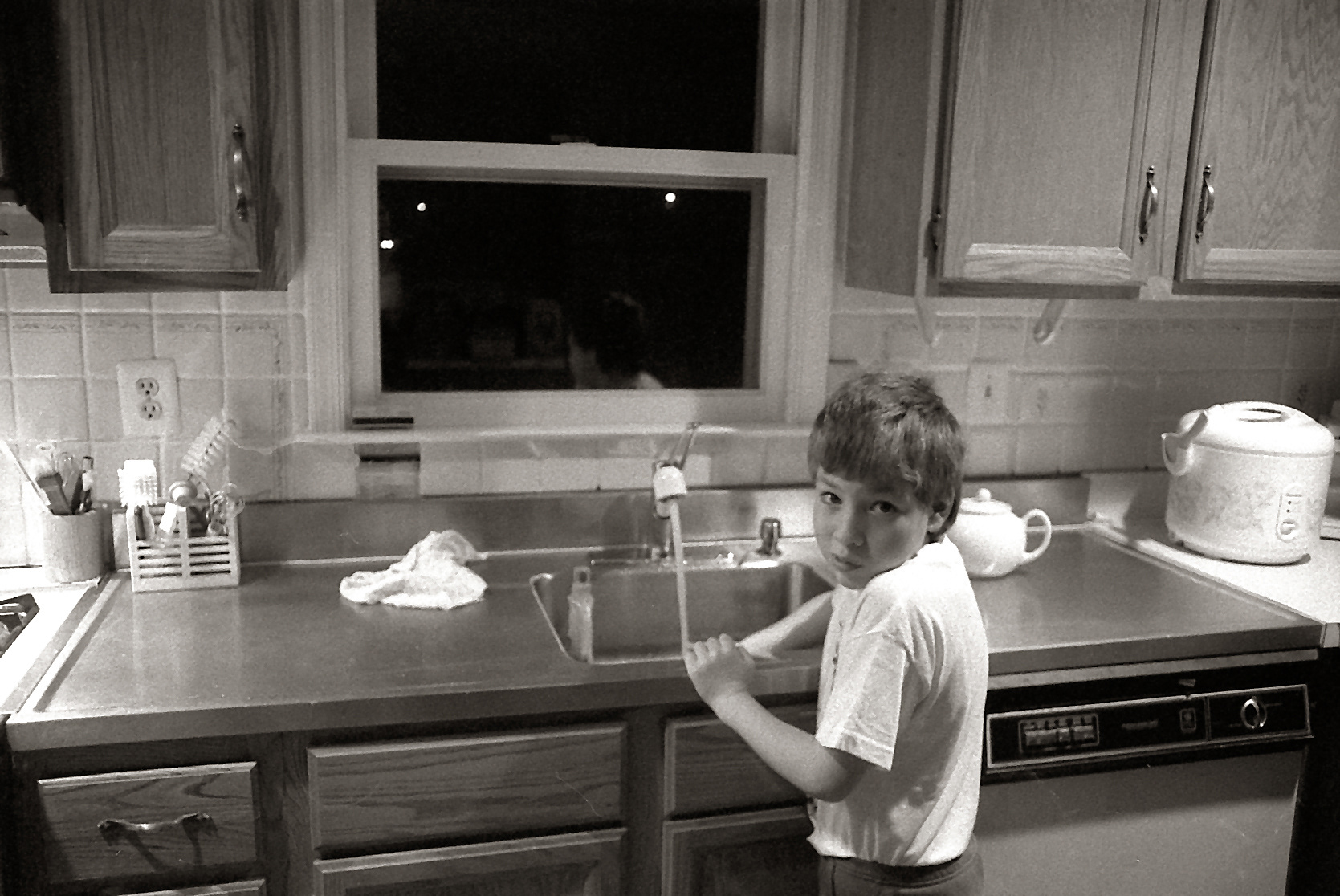 Jaime age 6 playing with the running water