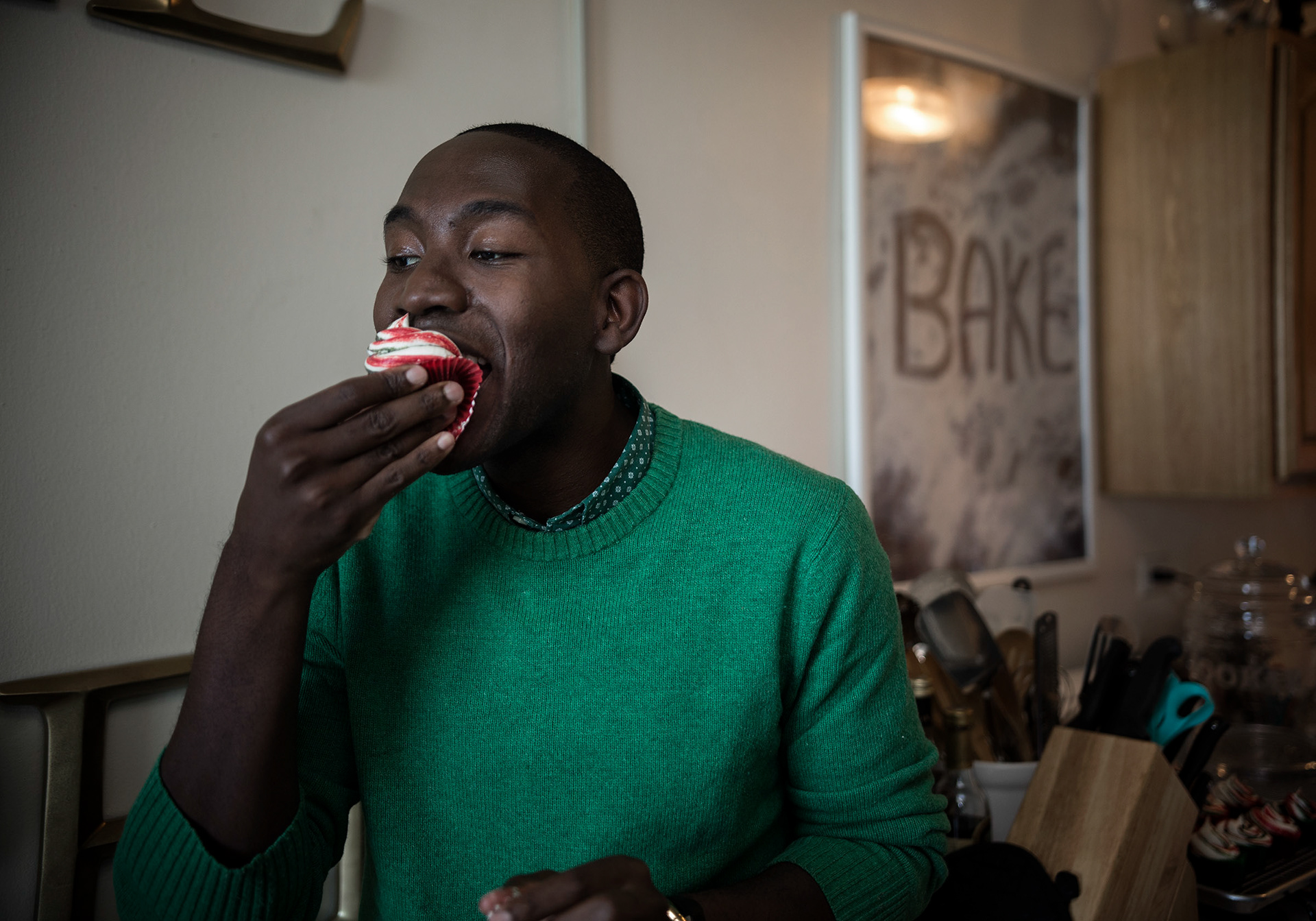Buki Elegbede of “The Buki Show,” bakes homemade chocolate candy cane swirl cupcakes for the holiday season in Newark. (Jane Therese for Edible New Jersey)