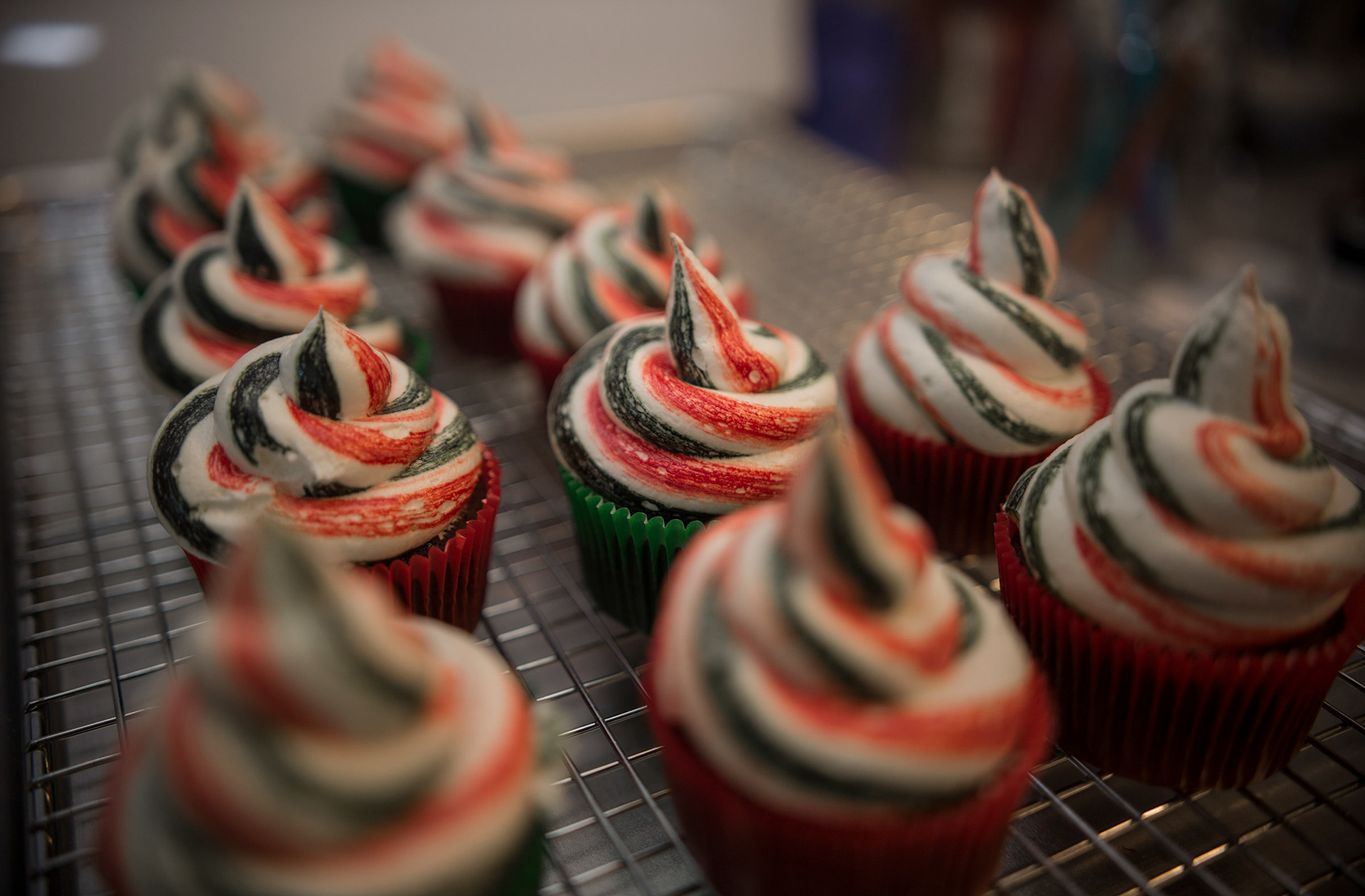 Buki Elegbede of “The Buki Show,” bakes homemade chocolate candy cane swirl cupcakes for the holiday season in Newark. (Jane Therese for Edible New Jersey)
