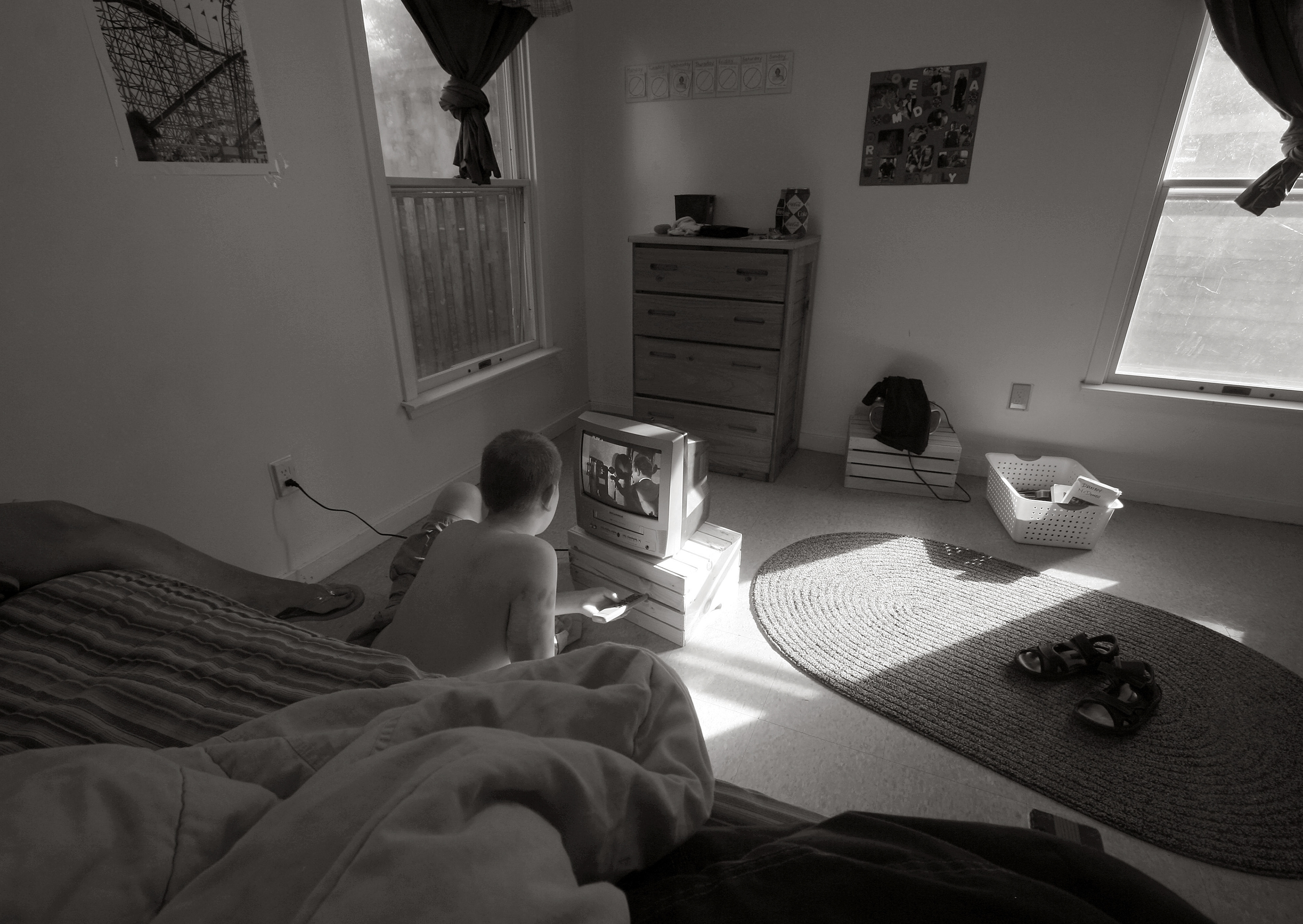 Danny watche television in his room at Bancroft