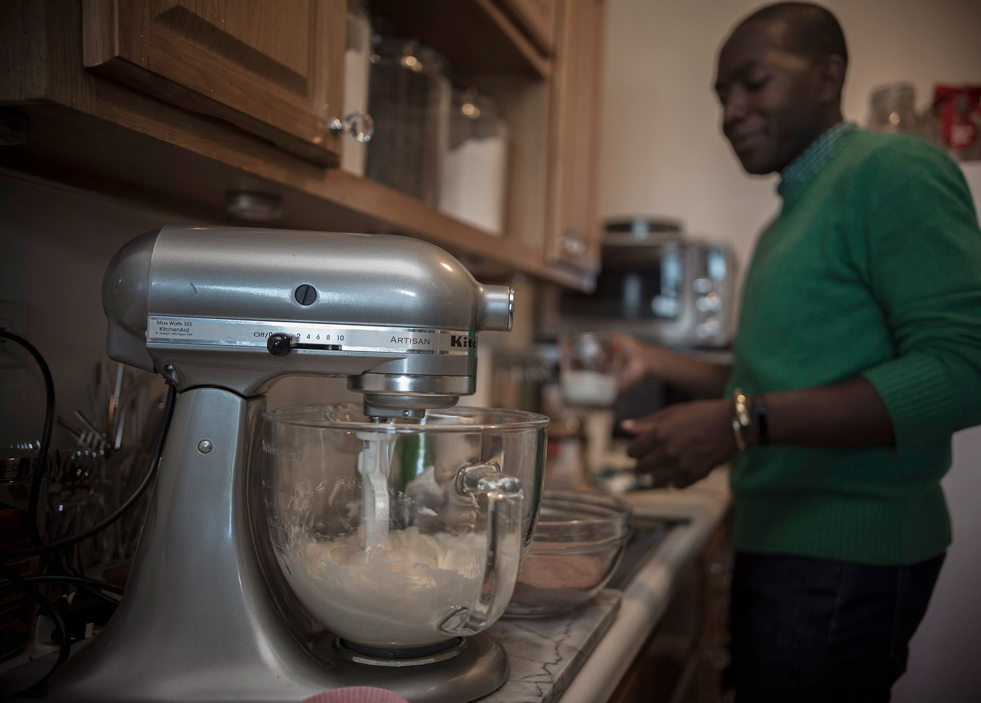 Buki Elegbede of “The Buki Show,” bakes homemade chocolate candy cane swirl cupcakes for the holiday season in Newark. (Jane Therese for Edible New Jersey)
