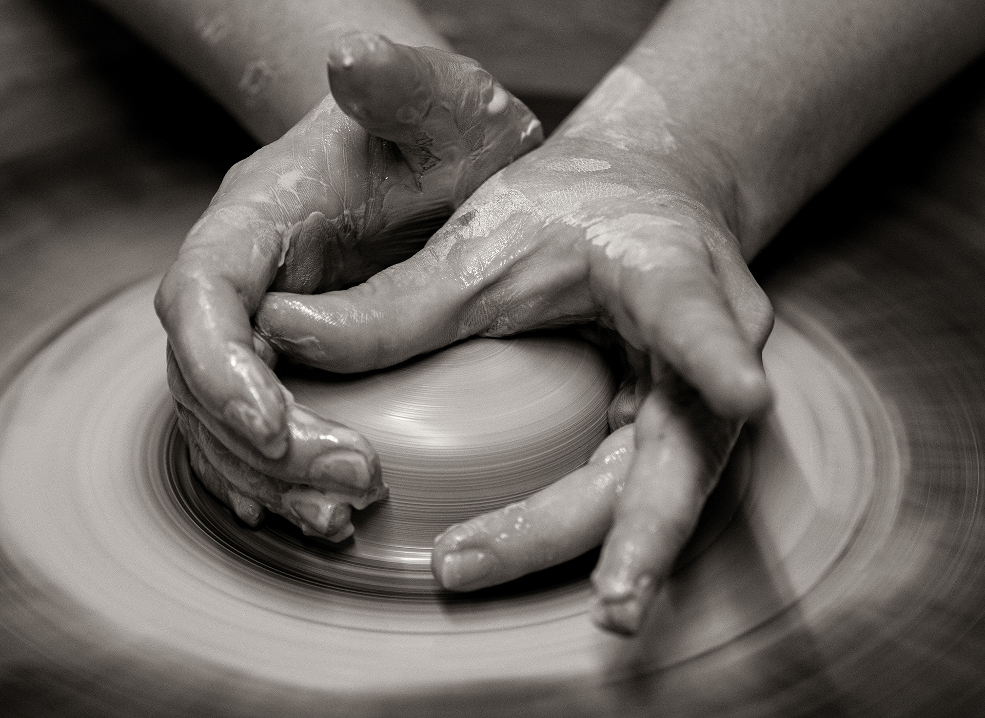 Potter Ashlynn Zulinski at her potter’s wheel in Dover Saturday, September 19, 2020 in Delaware. “To me, work means getting out of bed every single morning loving what you’re doing to create a life for yourself.” Says Zulinski. “I’ve learned over the years that life slows down for no one. I have endured multiple lifetimes of poverty, tragedy, heartbreak and loss. For a long time, I let those things define who I was as a person and I allowed those emotions to run my life for me. Today, I'm at the realization, that if I do not get up every single day with the purpose and intent on creating a beautiful and better life for myself, I will never have the life I want. Tragedies happen, hearts get broken, and we lose people we love often. My artwork gives me purpose and beauty at once. My work means I am able to share my gift while using this form of creative therapy to shape my future into something I desire.” (Photo by Jane Therese)