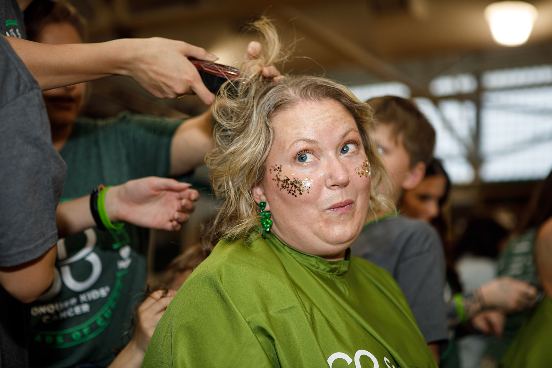 Shannon Petrunak of Emma’s has her head shaved on Friday, April 26, 2024, during the Emmaus Shave the Brave fundraiser at Emmaus High School in Emmaus. The event, intended to help raise money for children battling cancer, was sponsored by the St. Baldrick’s Foundation. (Jane Therese / Special to The Morning Call)