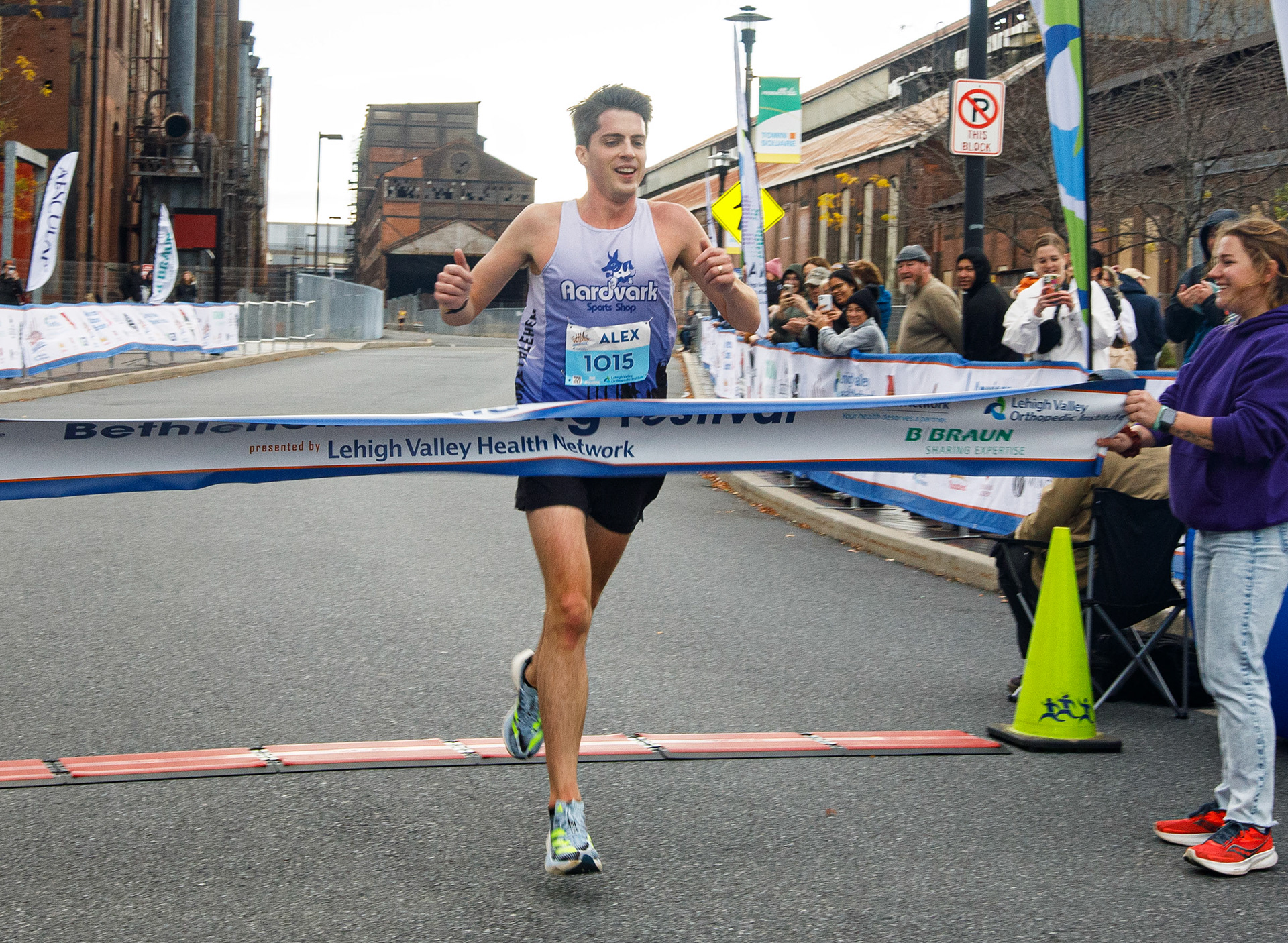 Alex Price of Team Vark wins the men’s division with a time of 1:09:42 at the finish of the Lehigh Valley Orthopedic Institute Half Marathon Sunday, Oct. 22, 2023, at SteelStacks in Bethlehem.