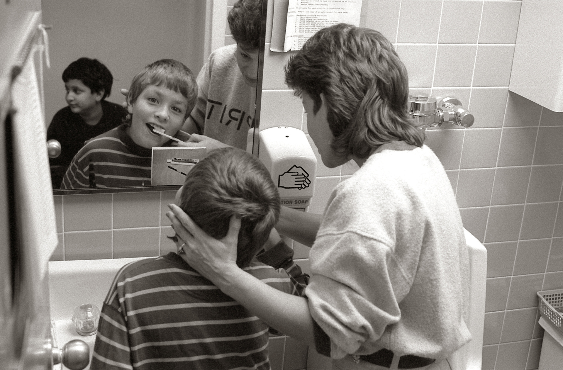 Jaime brushes his teeth at Eden Institute