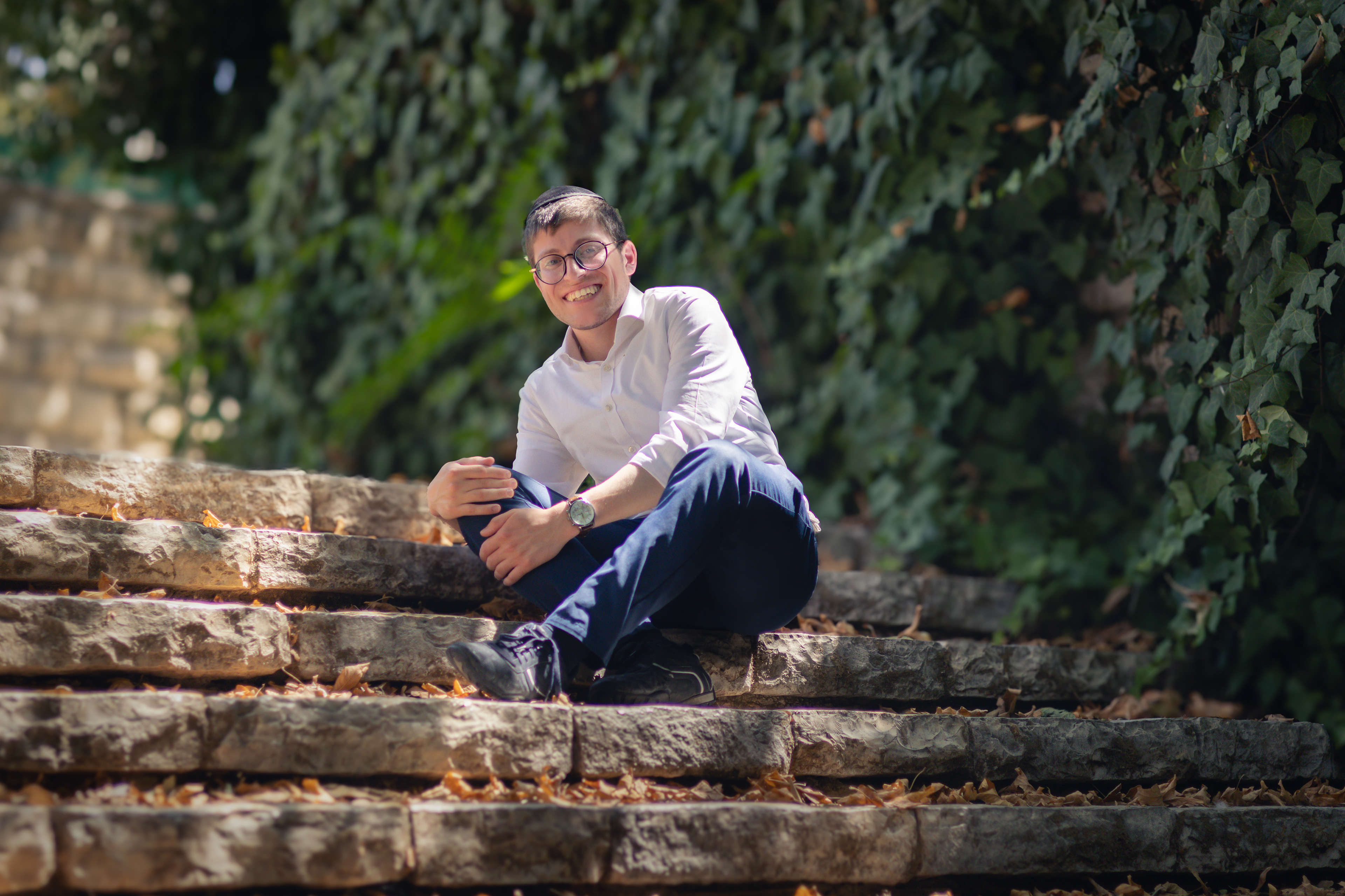 young man sitting on stairs