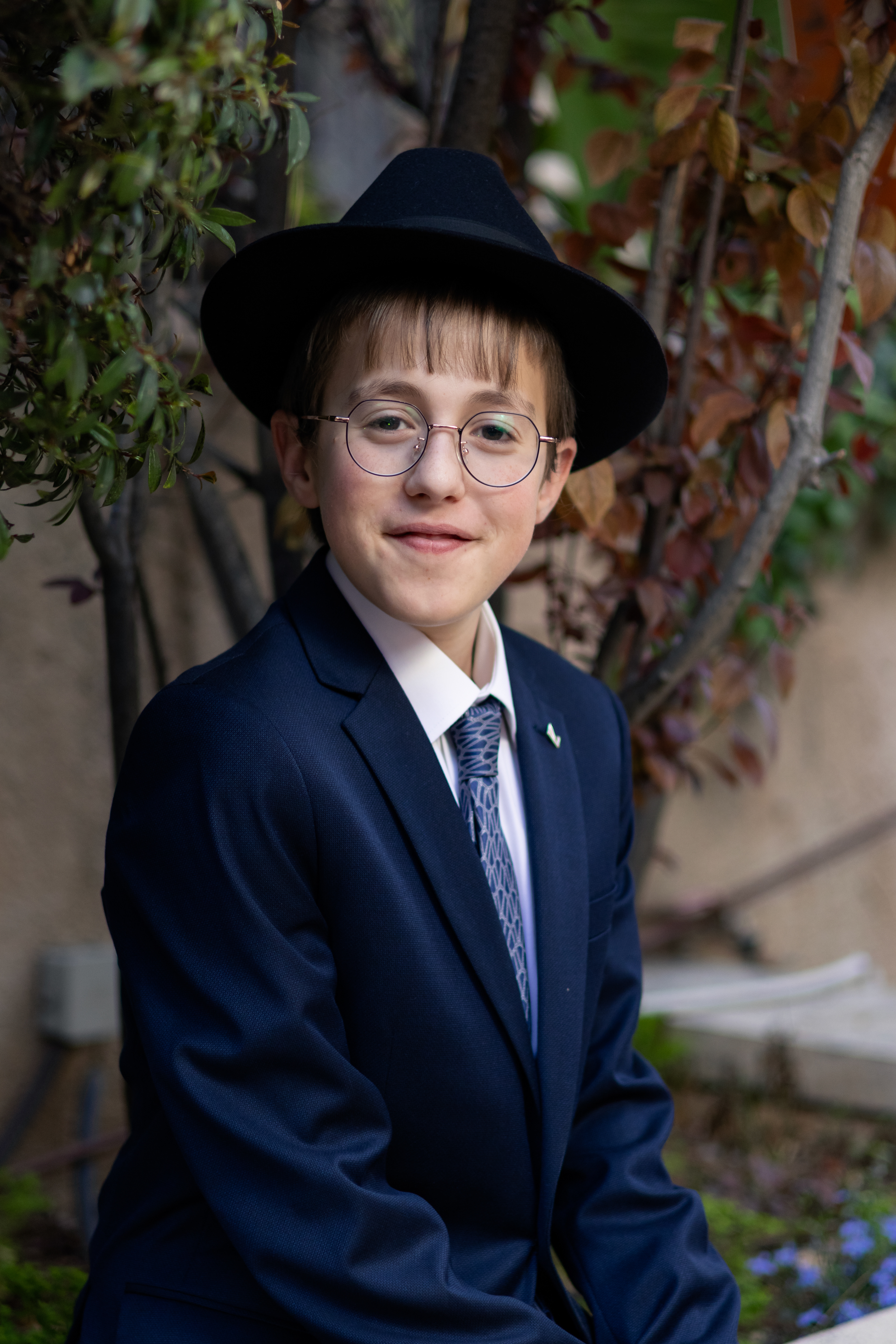 young boy posing for photo