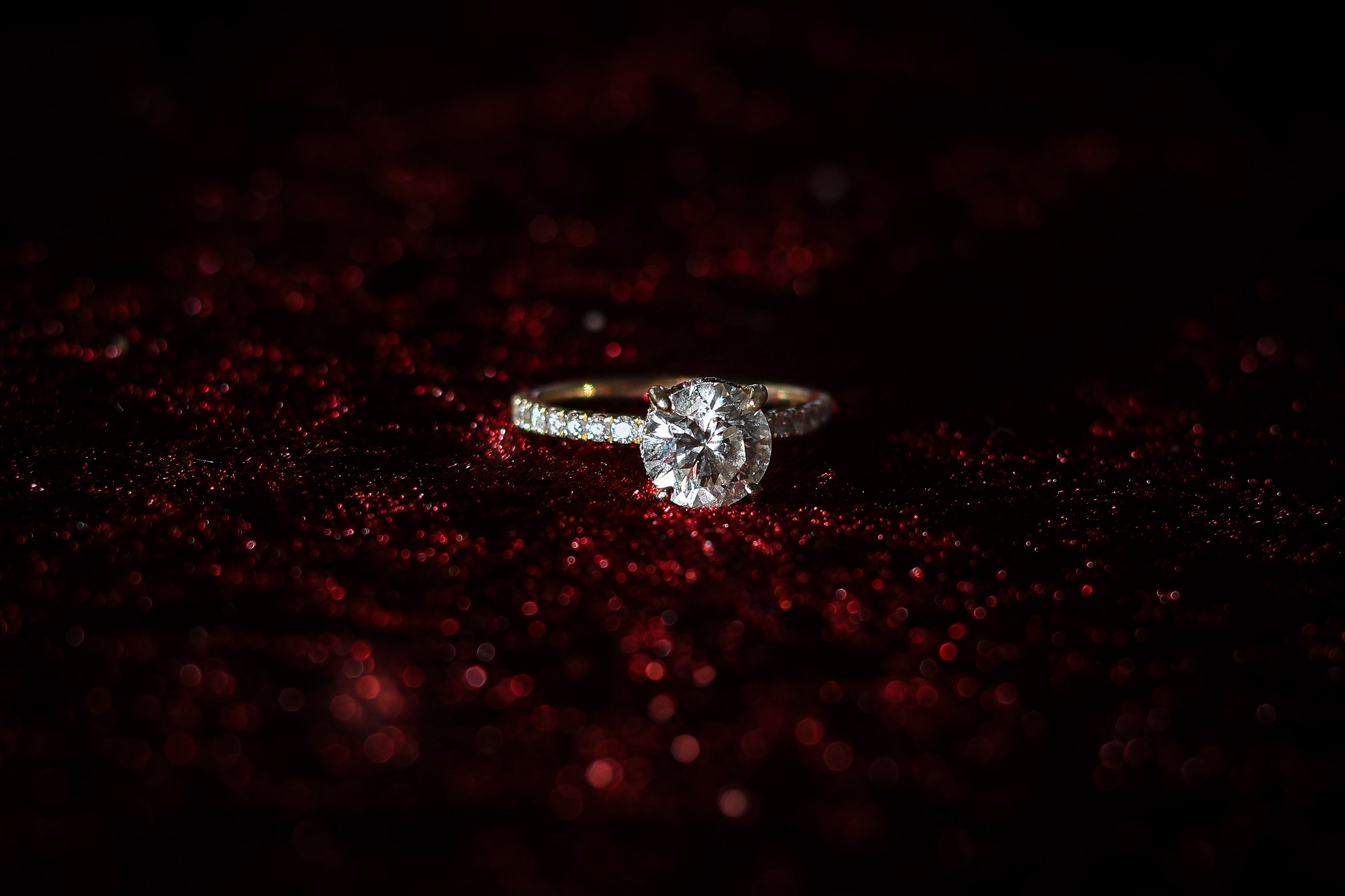 diamond ring on red velvet