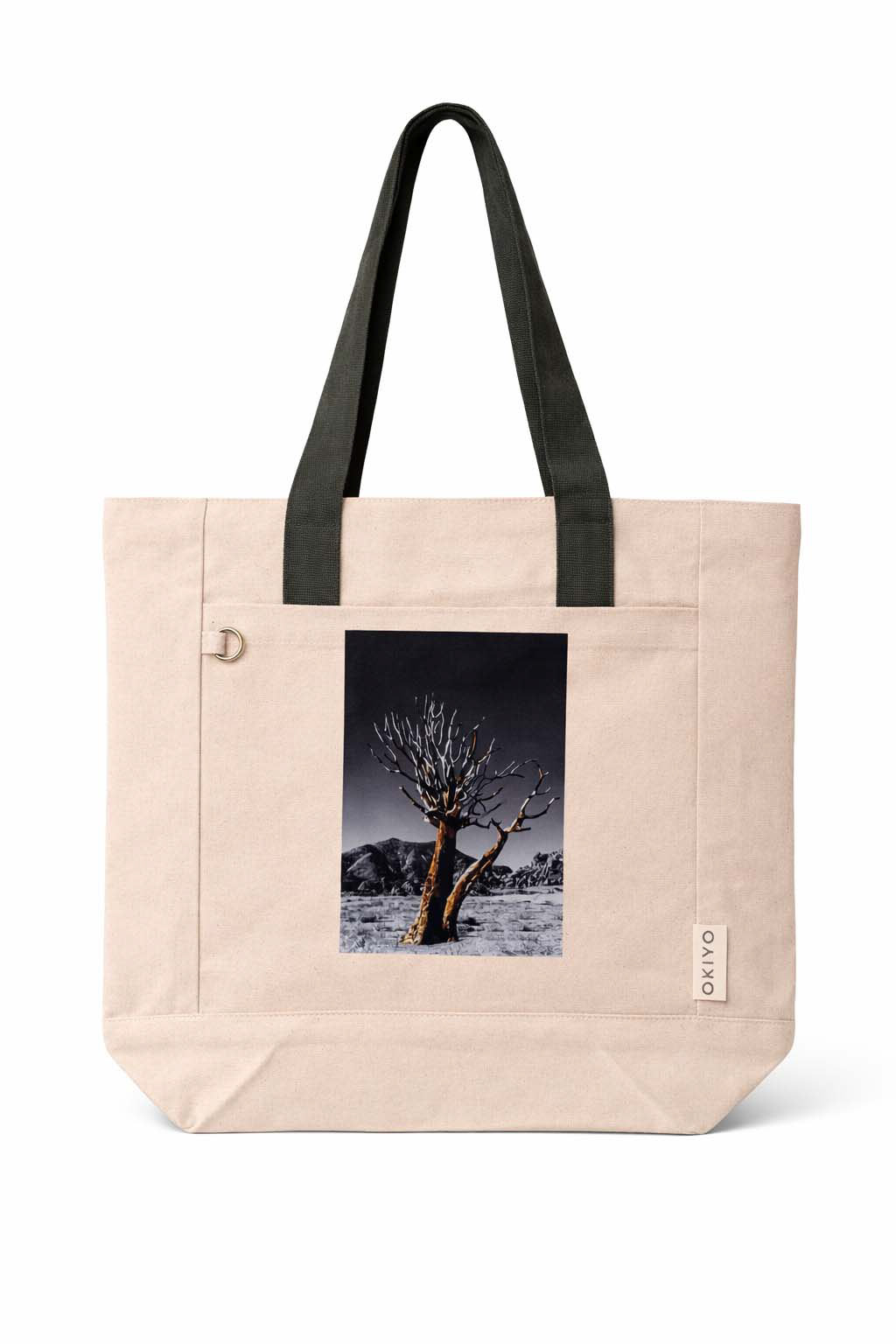 Rooted in resilience, beauty thrives even in harsh places. Okiyo Tansu Recycled Canvas Conference Tote.