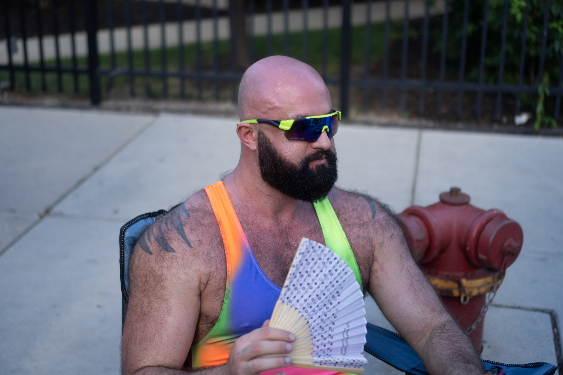 lunch break for the giant in a rainbow leotard