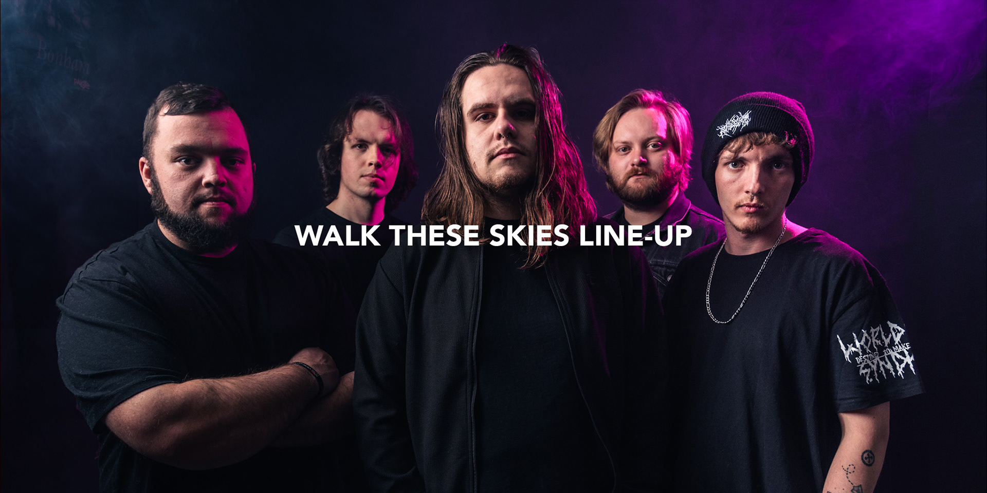 south african melodic metalcore band members photographed in a studio setting with vibrant colourfull background lights and moody smoke effects photographed by black rock studio