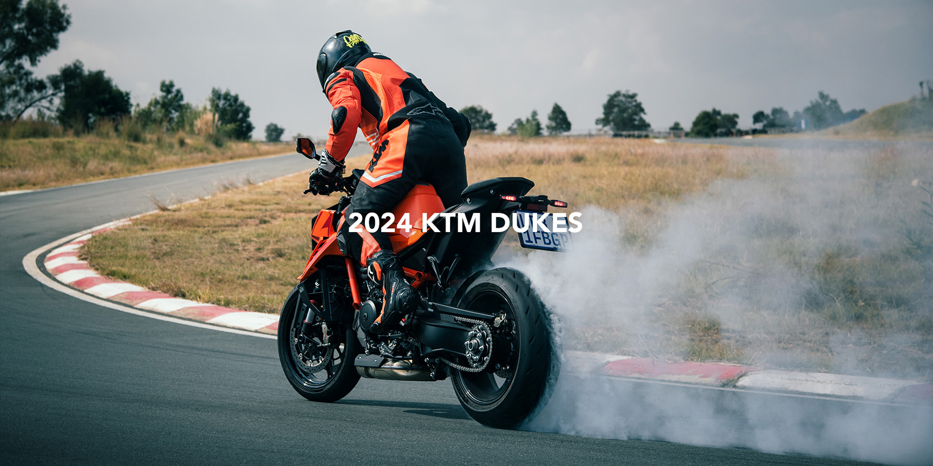 2024 ktm 1390 duke r doing a burnout on a race track in johannesburg photographed by black rock studio for ridefast magazine