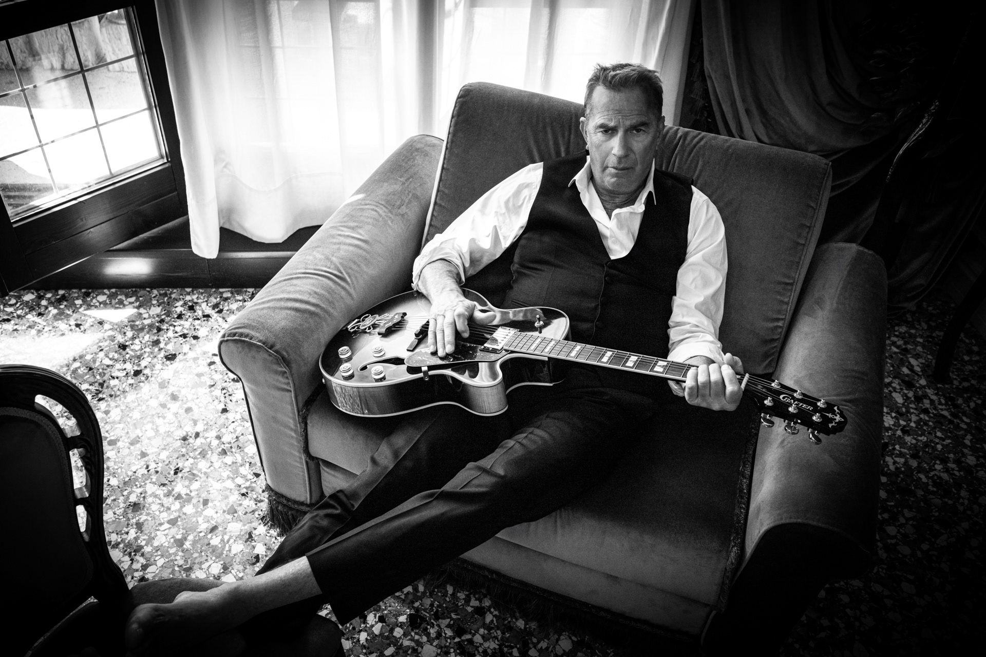 Guitar – Kevin Costner