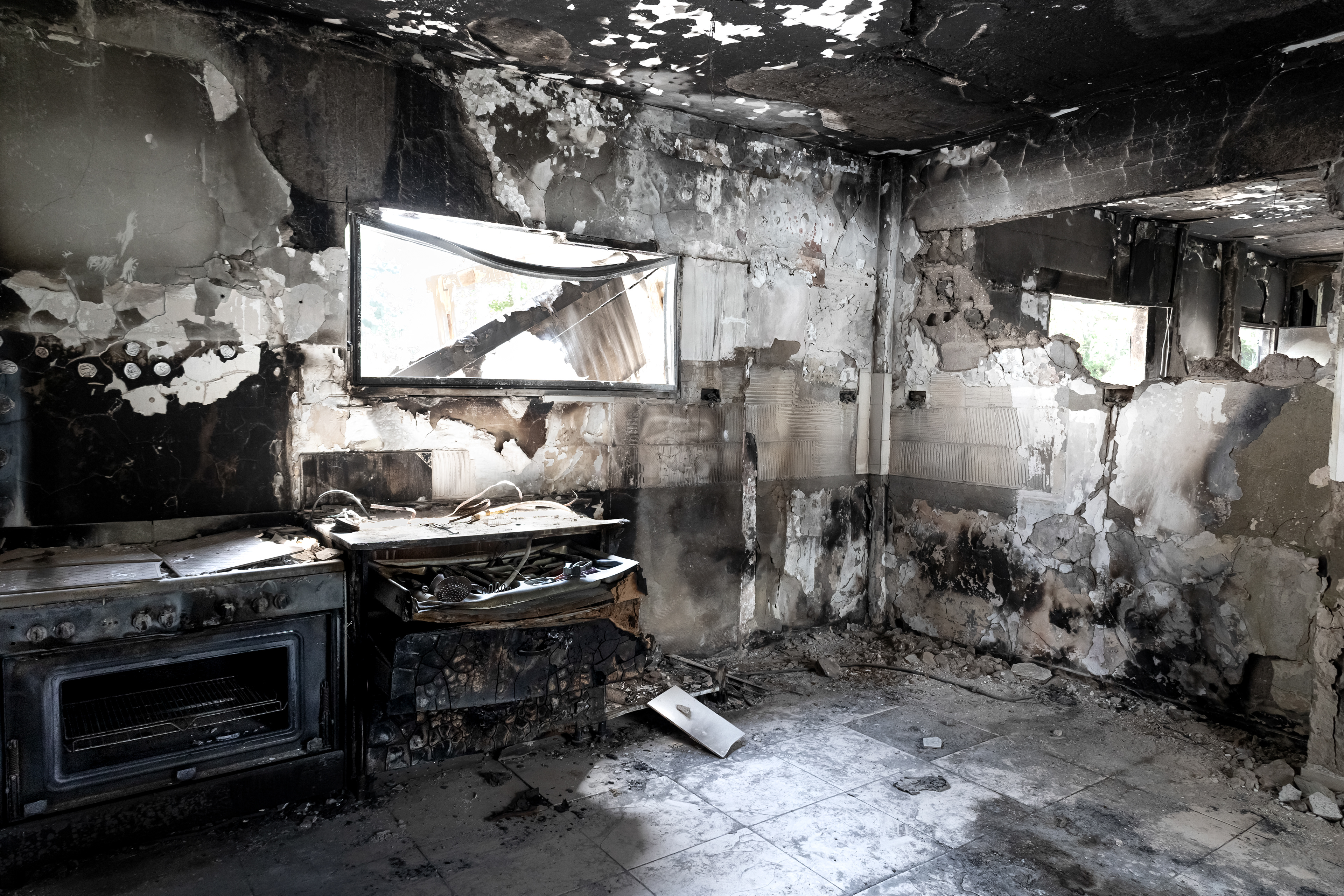 A house burned and destroyed in Nir Oz on October 7, 2023.