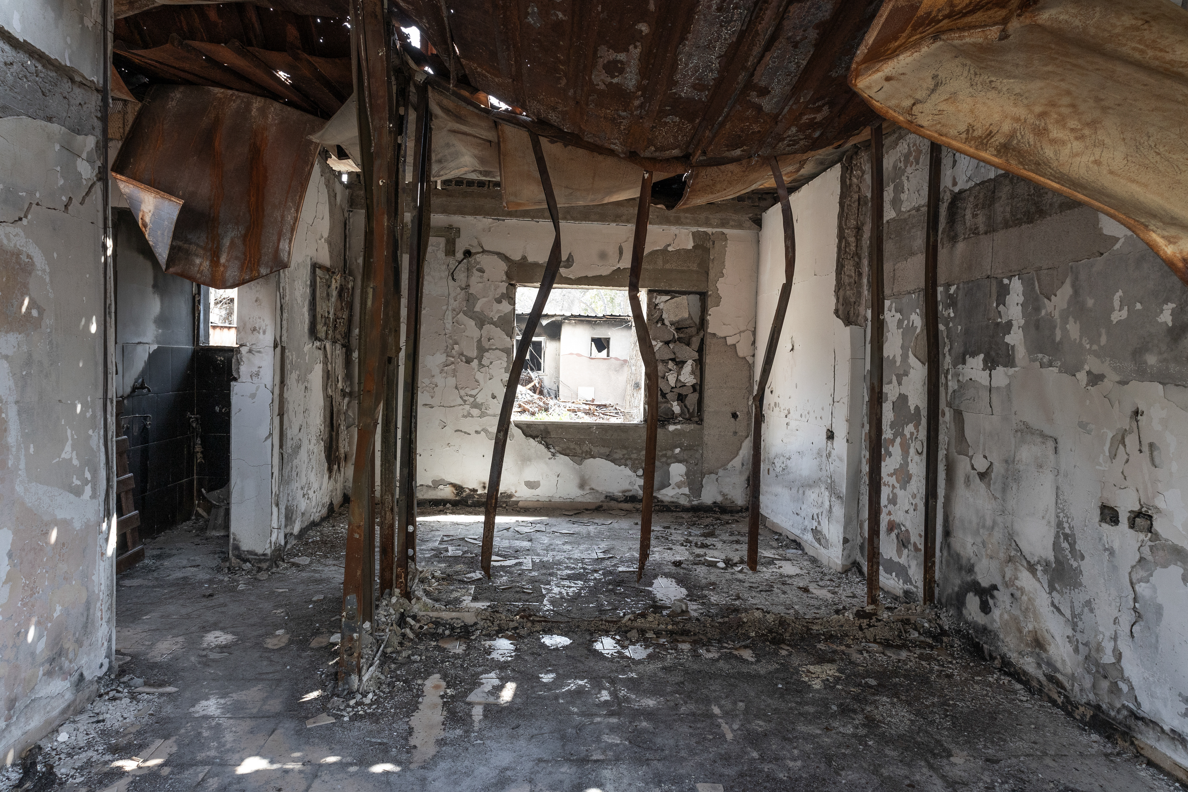 A house burned and destroyed in Nir Oz on October 7, 2023.