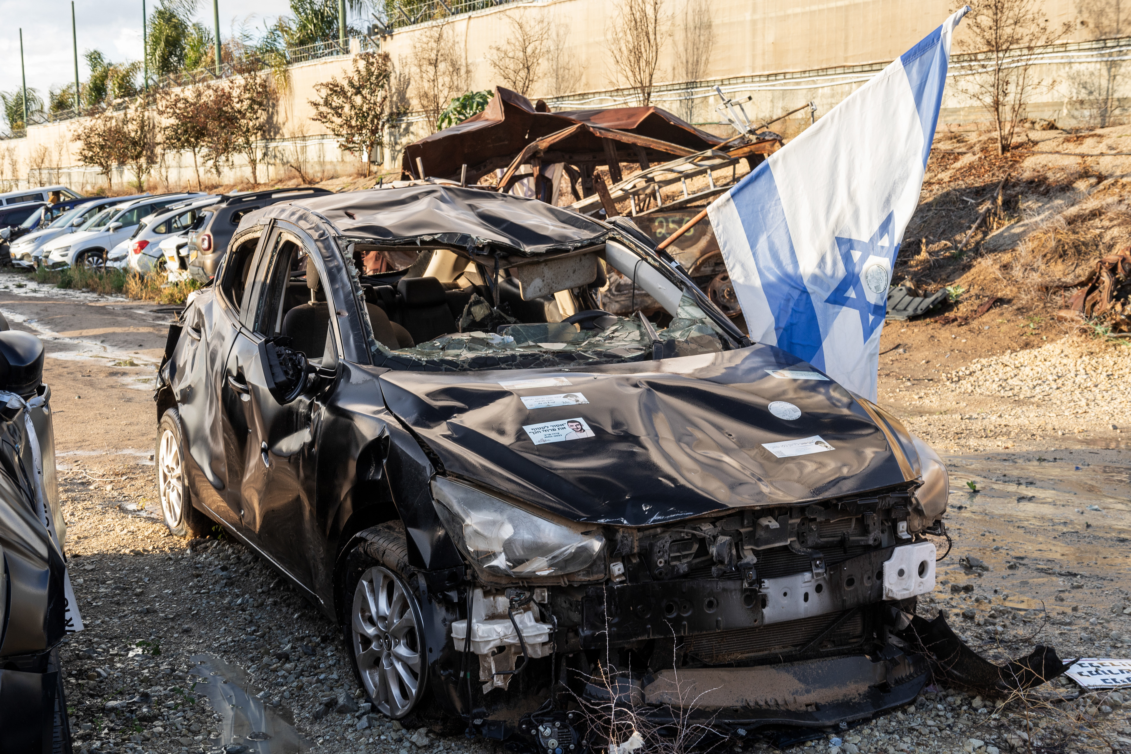 A destroyed car at the car cemetery from October 7, 2023.