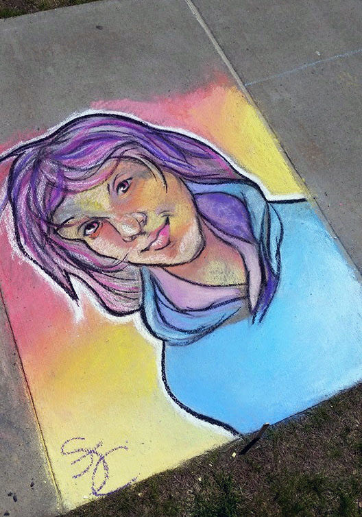 Shows a self portrait of Sasha Cubero in colorful chalk on the sidewalk.