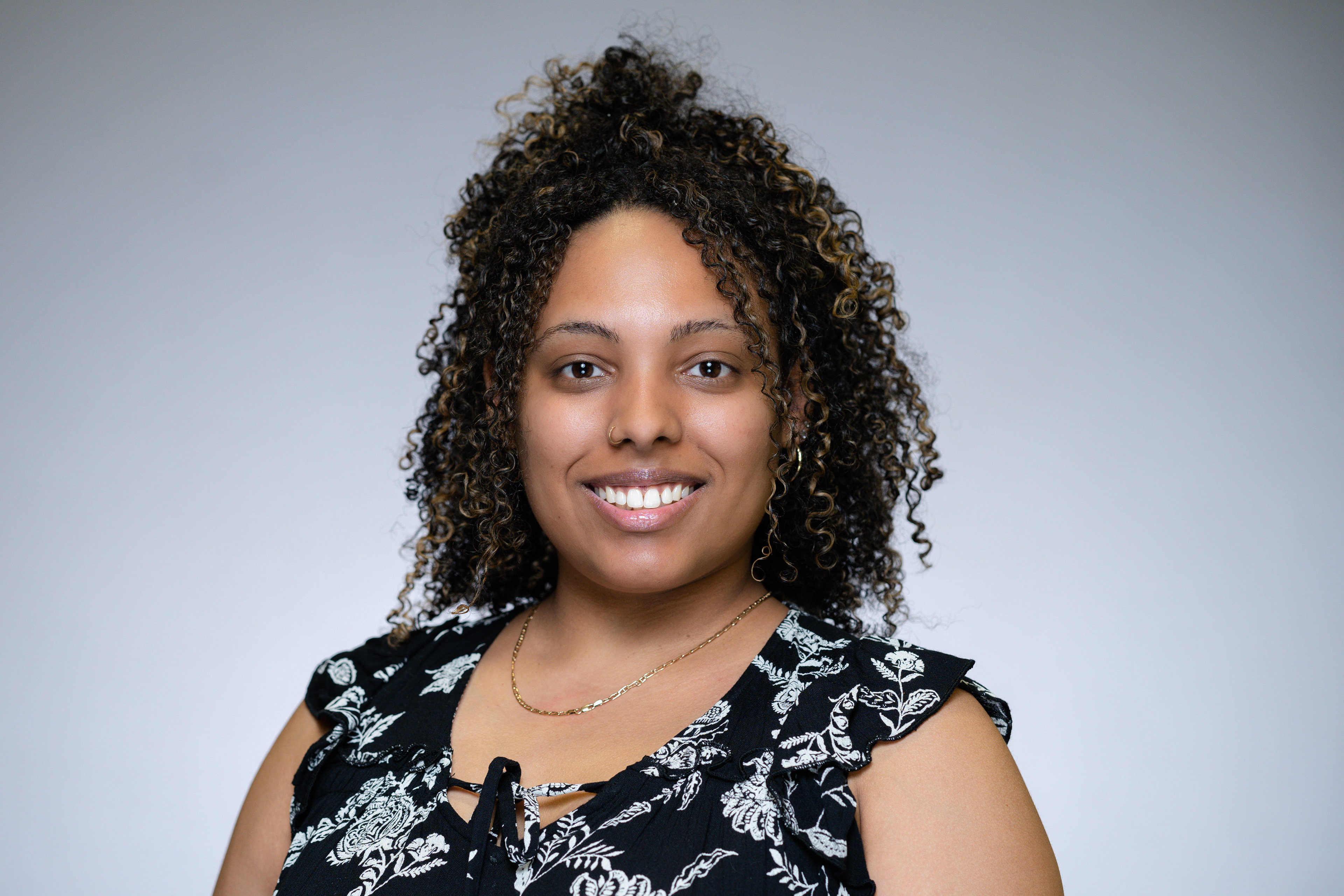 Professional head-shot of Sasha Cubero.