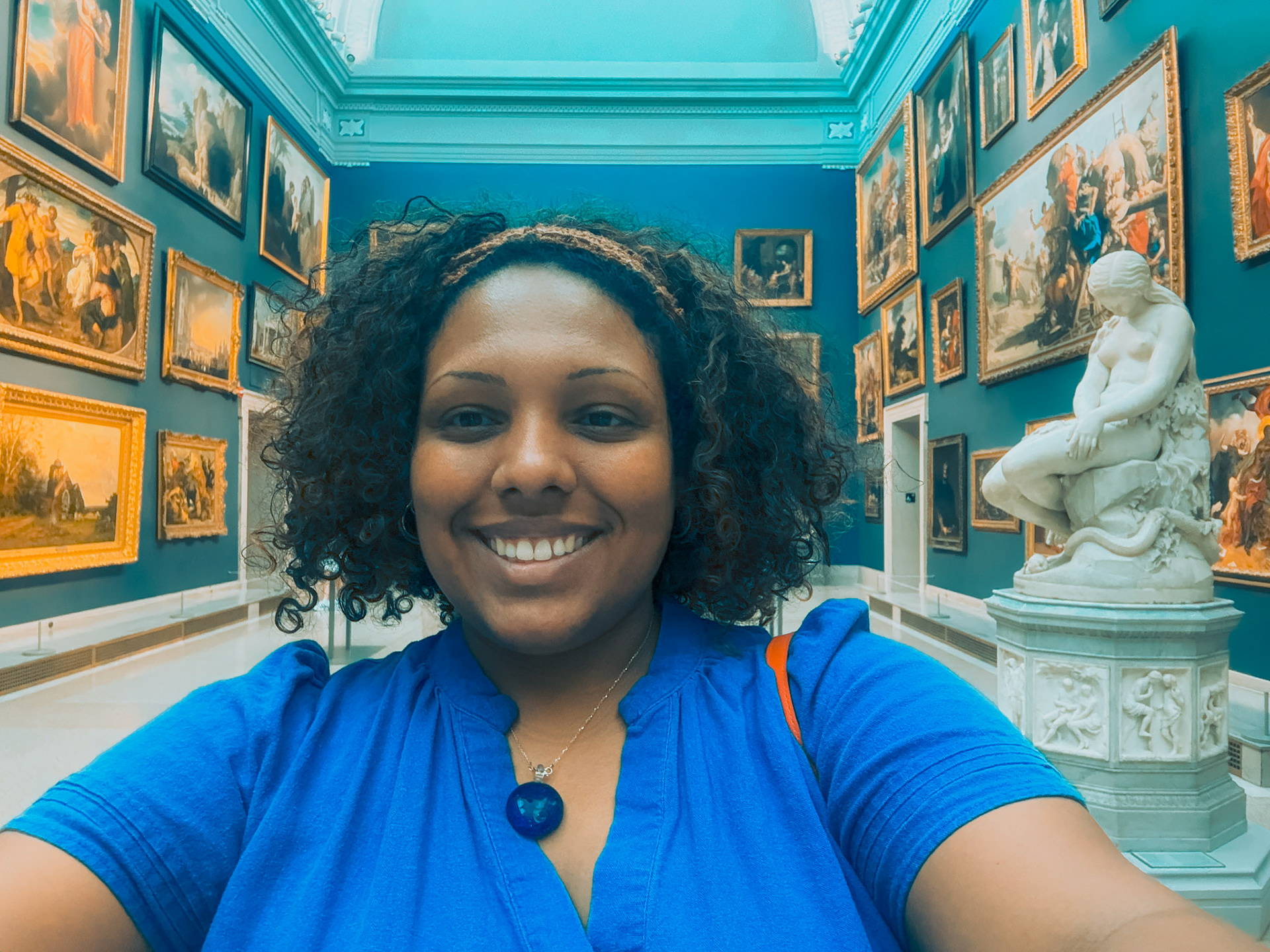 Sasha Cubero taking selfie in the Morgan Great Hall.