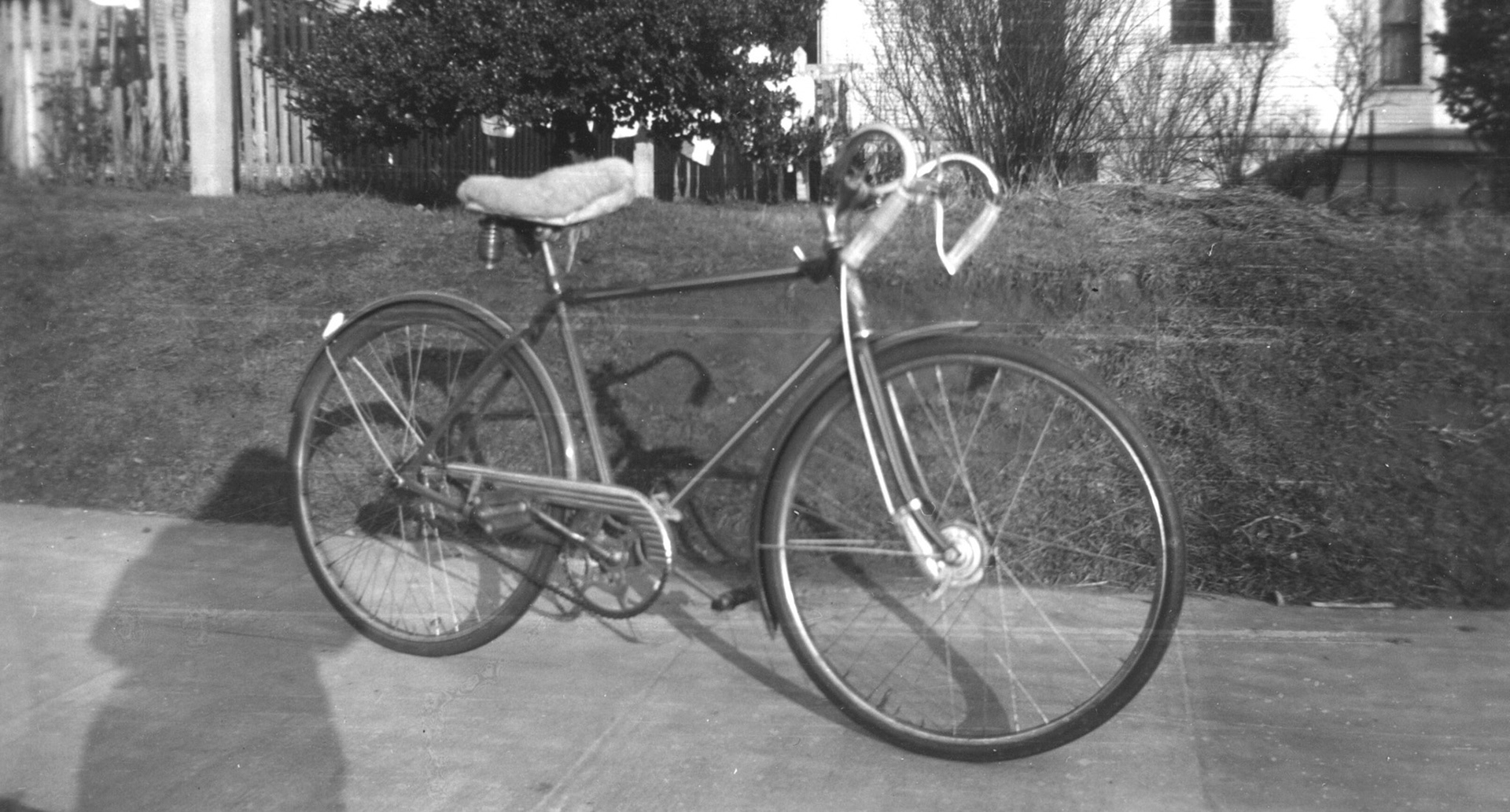 Margurite Stovall's bike The Green hornet at Lawrence Ave, Portland, 1944. 9315 miles across the US and Canada and back, but with the bike rigged to carry her kit.