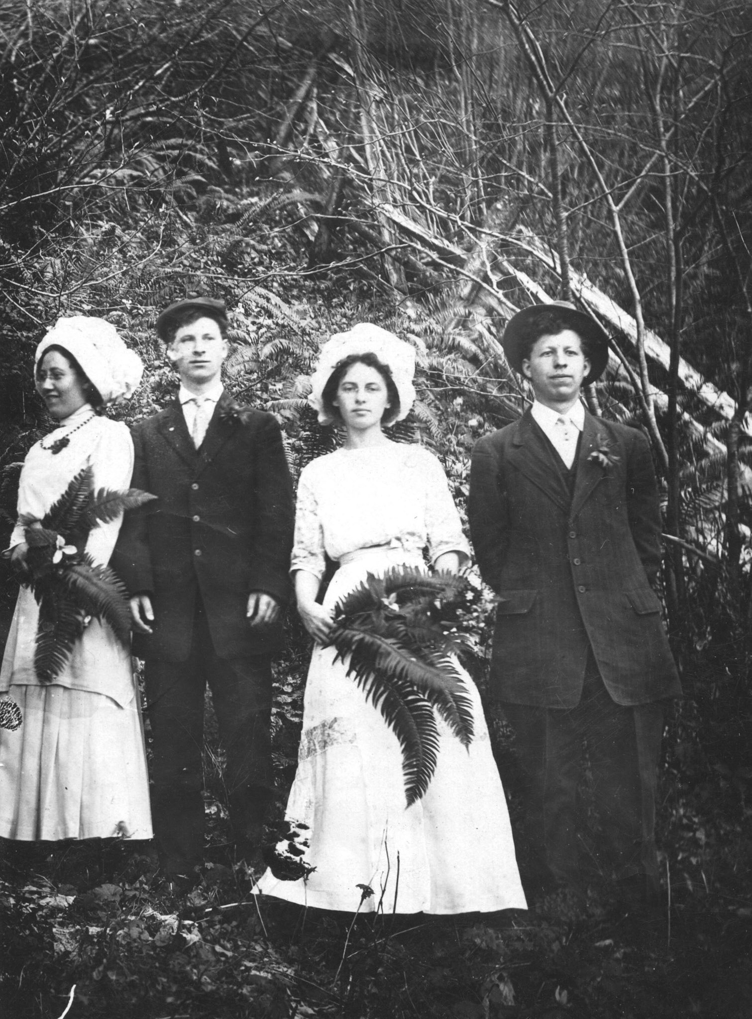 Charles and Frank Stovall and Anna Pearce and Metha Fehler, students of Philomath College. Frank and Metha are Red's parents and my grandparents.
