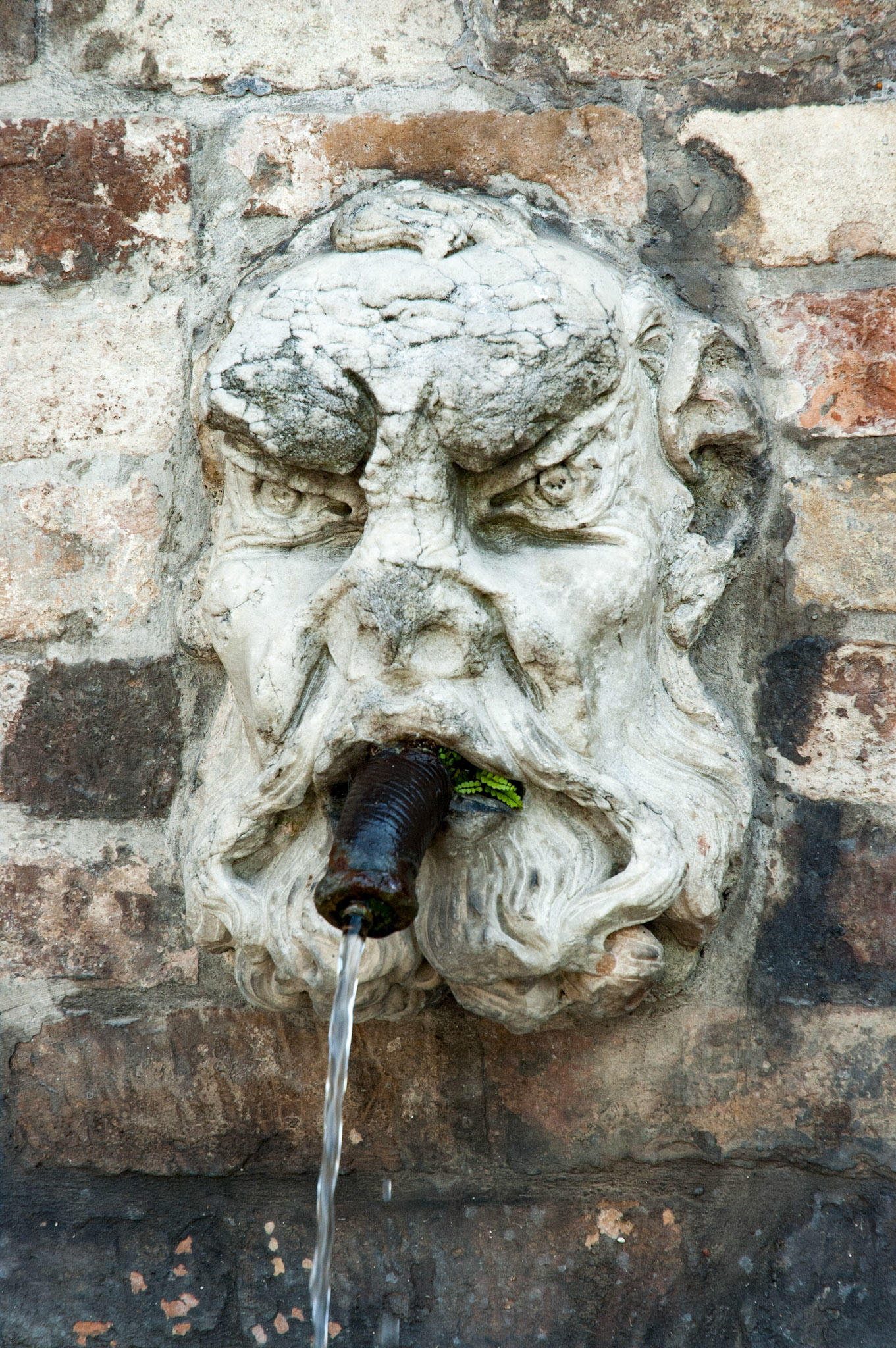 A fountain in a wall.