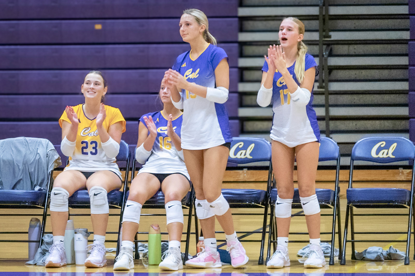 GAME HYPE  Always locked in on the game, Freshman Adelle Seif and Sophmore Emma Bowman celebrate every point. (Photo by Aslyn Crocker)